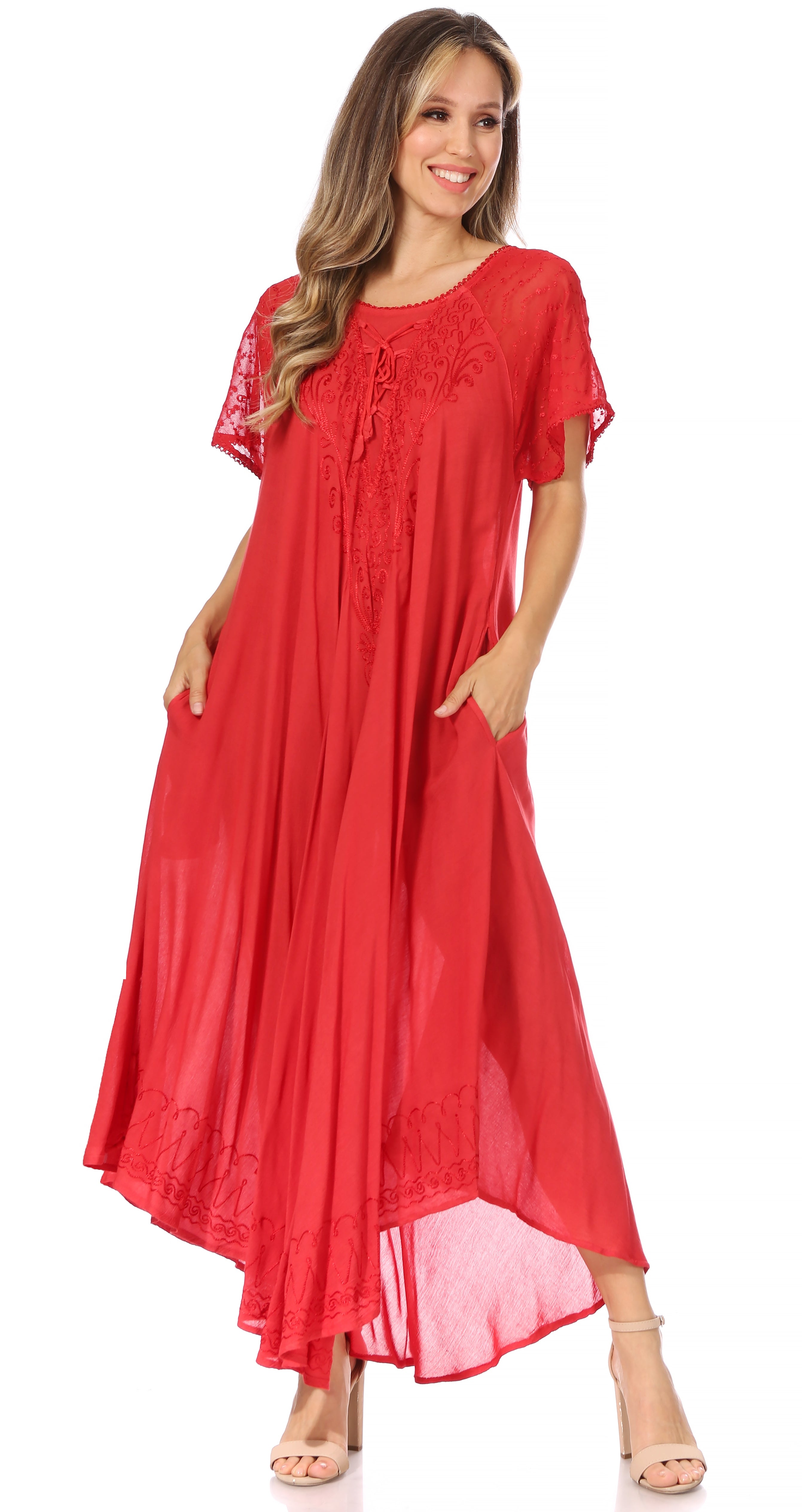 Woman wearing a red dress with lace details on a white background