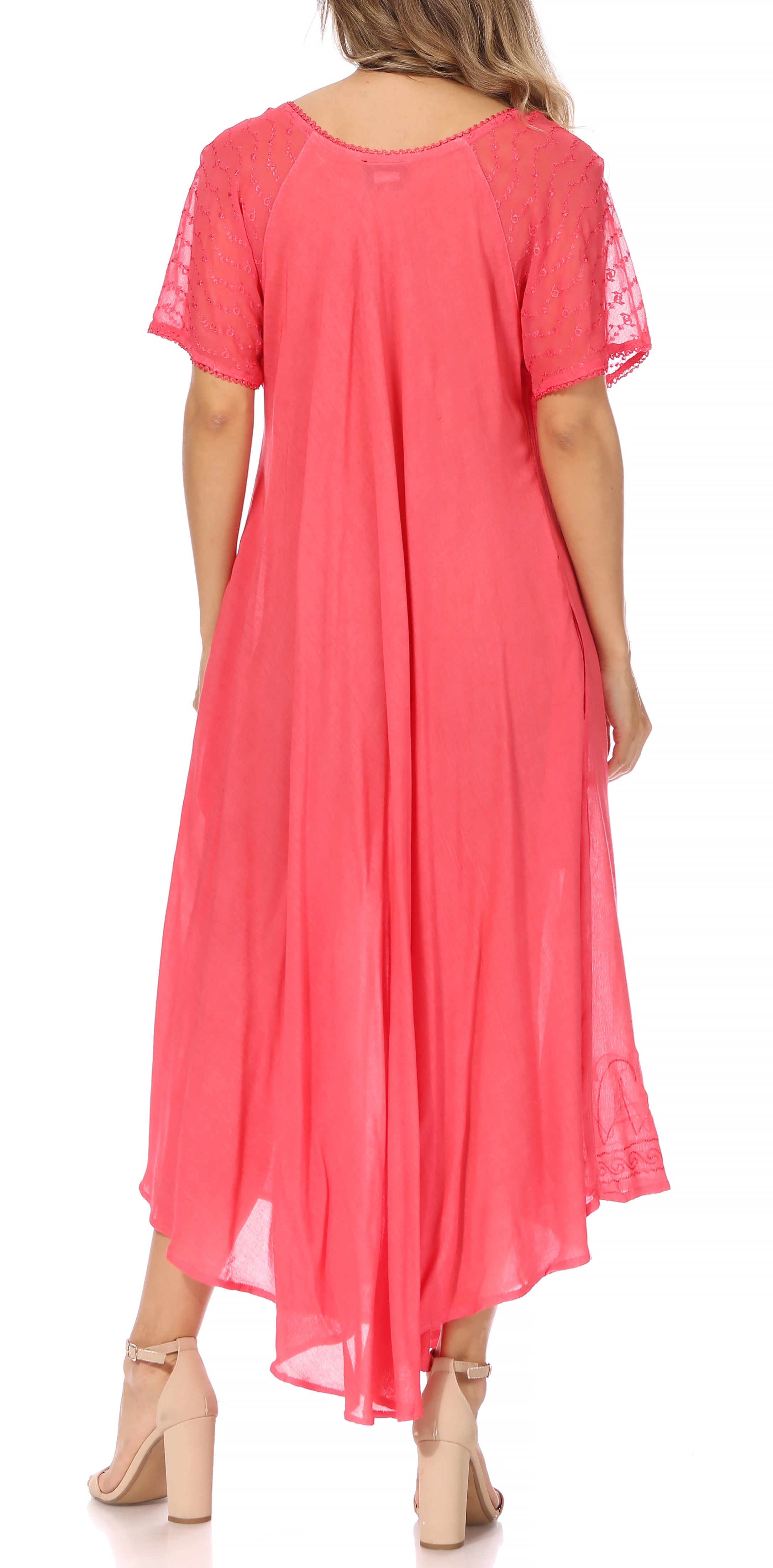 Coral dress with lace sleeves worn by a person on a white background