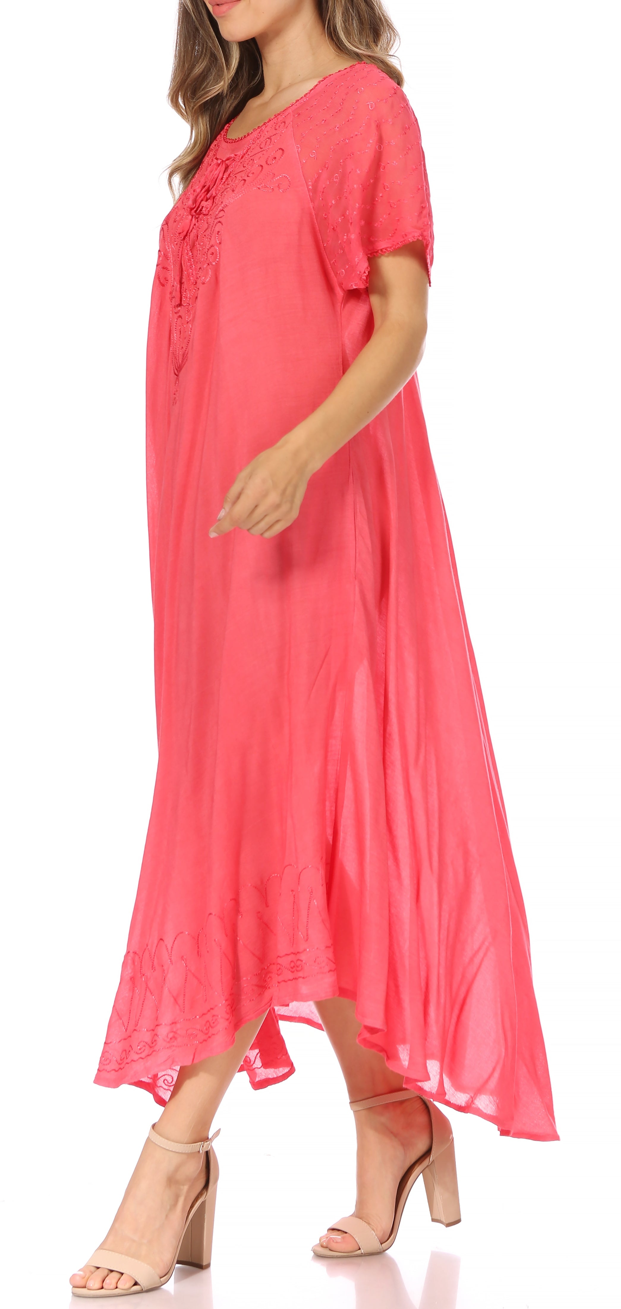 Woman wearing a pink dress on a white background