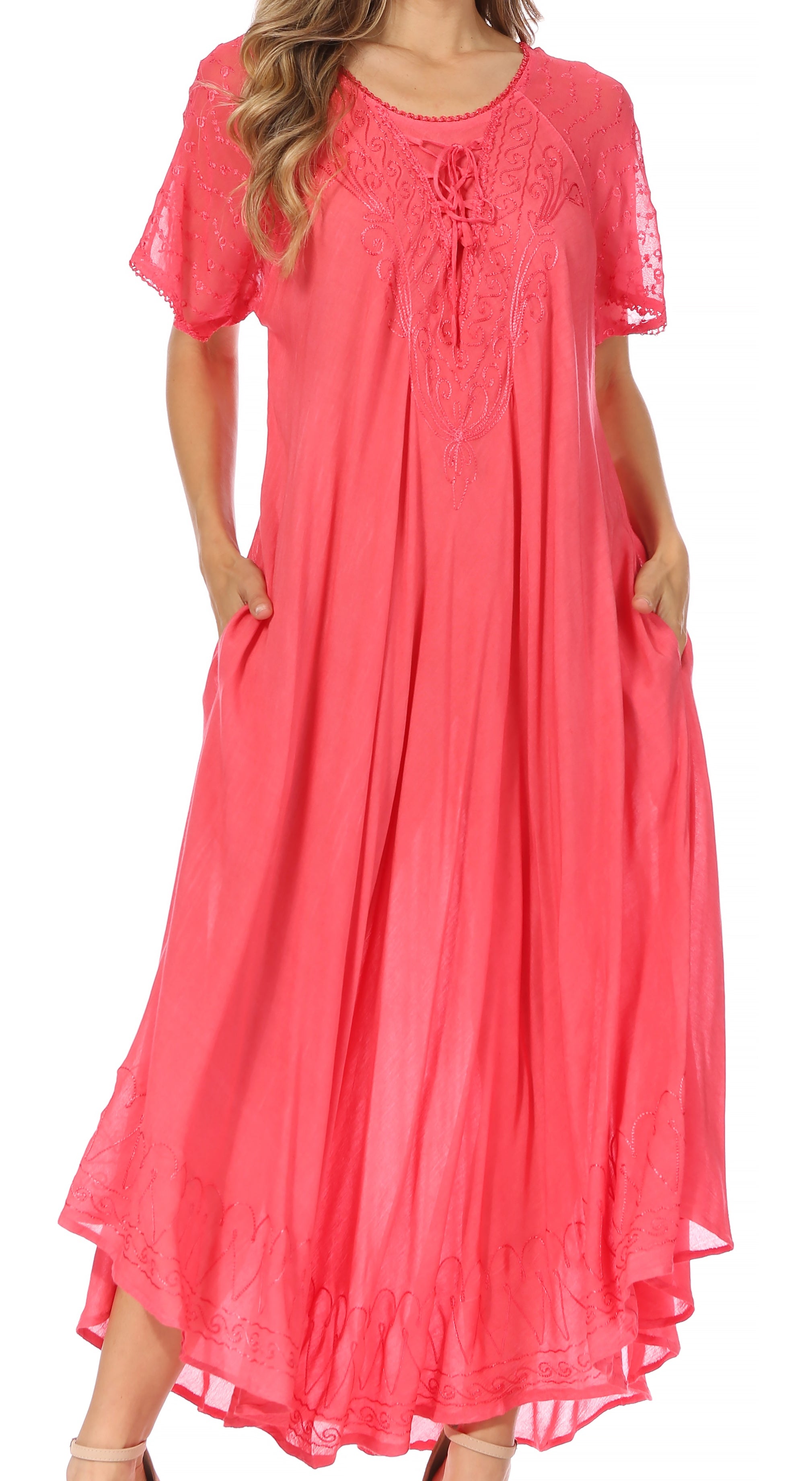 Coral pink dress with lace details on a white background