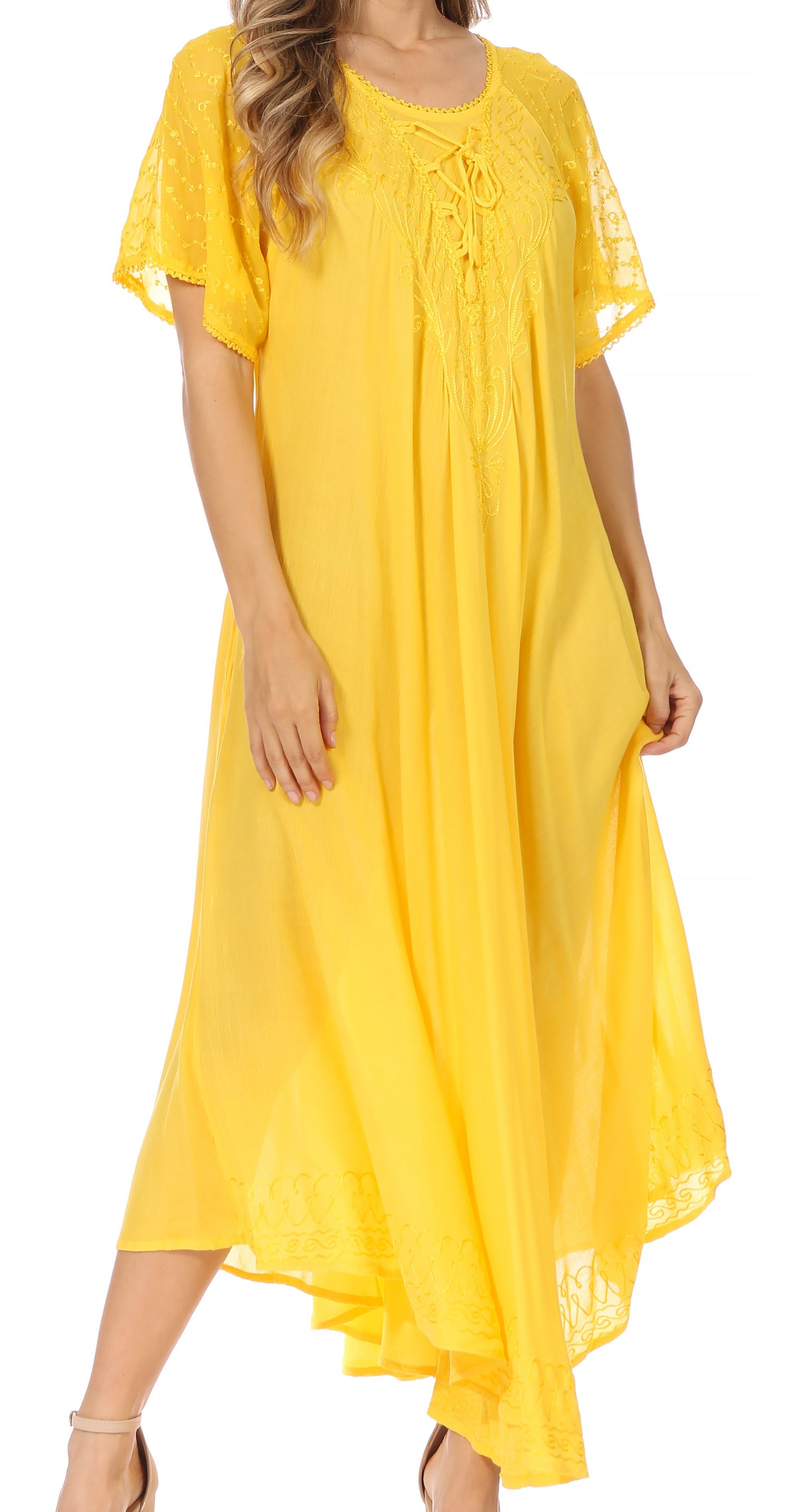 Yellow dress with lace details on a white background