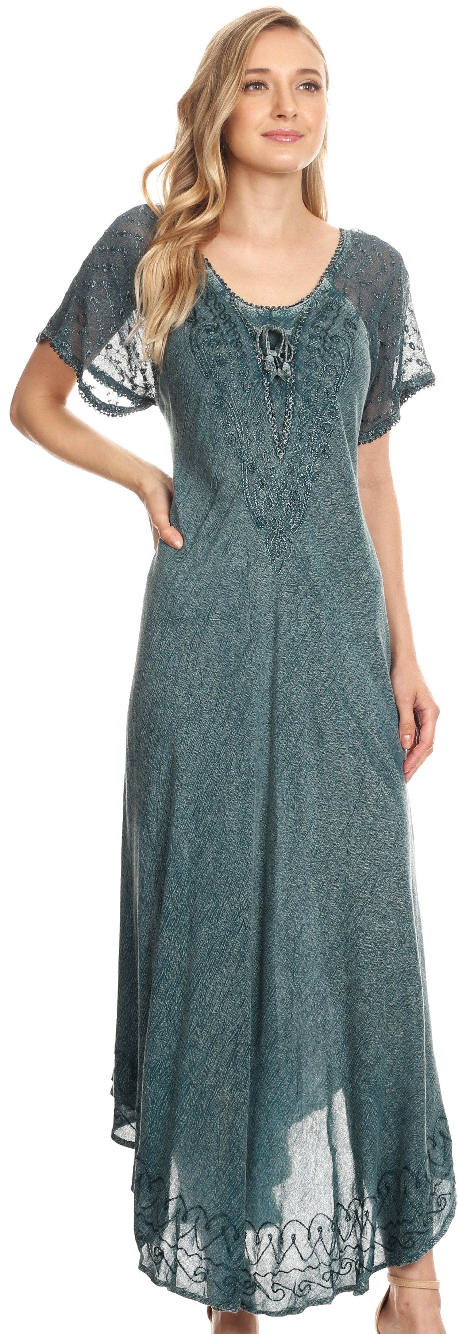 Woman wearing a teal lace dress with a white background