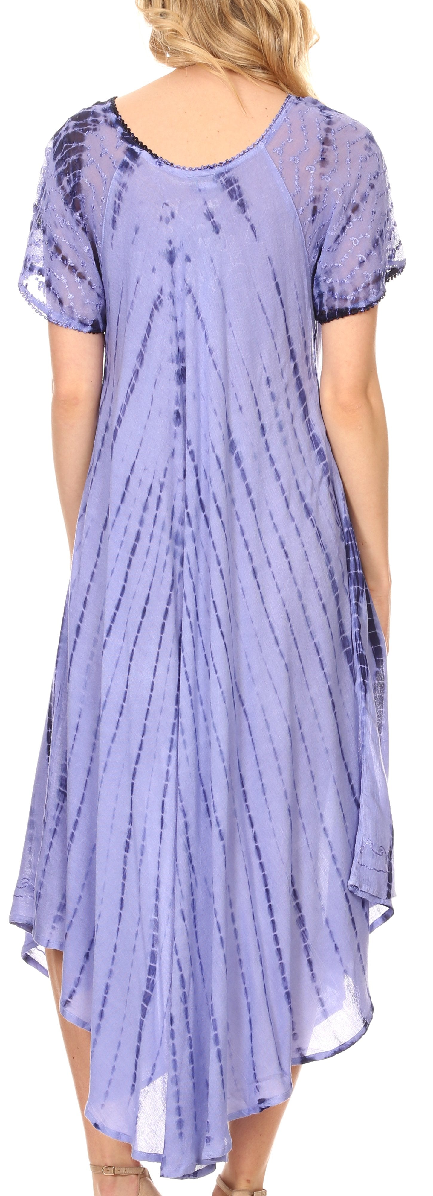 Woman wearing a purple tie-dye dress with a back view