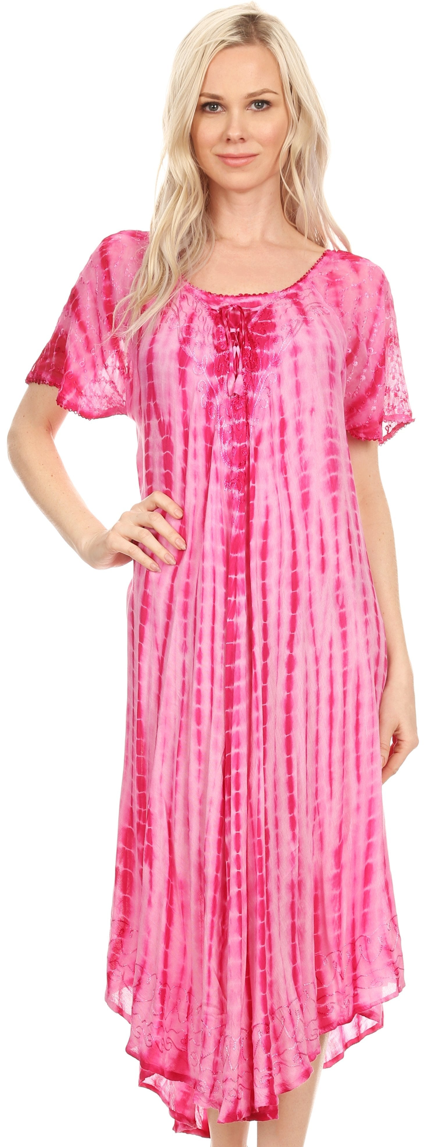Woman wearing a pink tie-dye dress on a white background