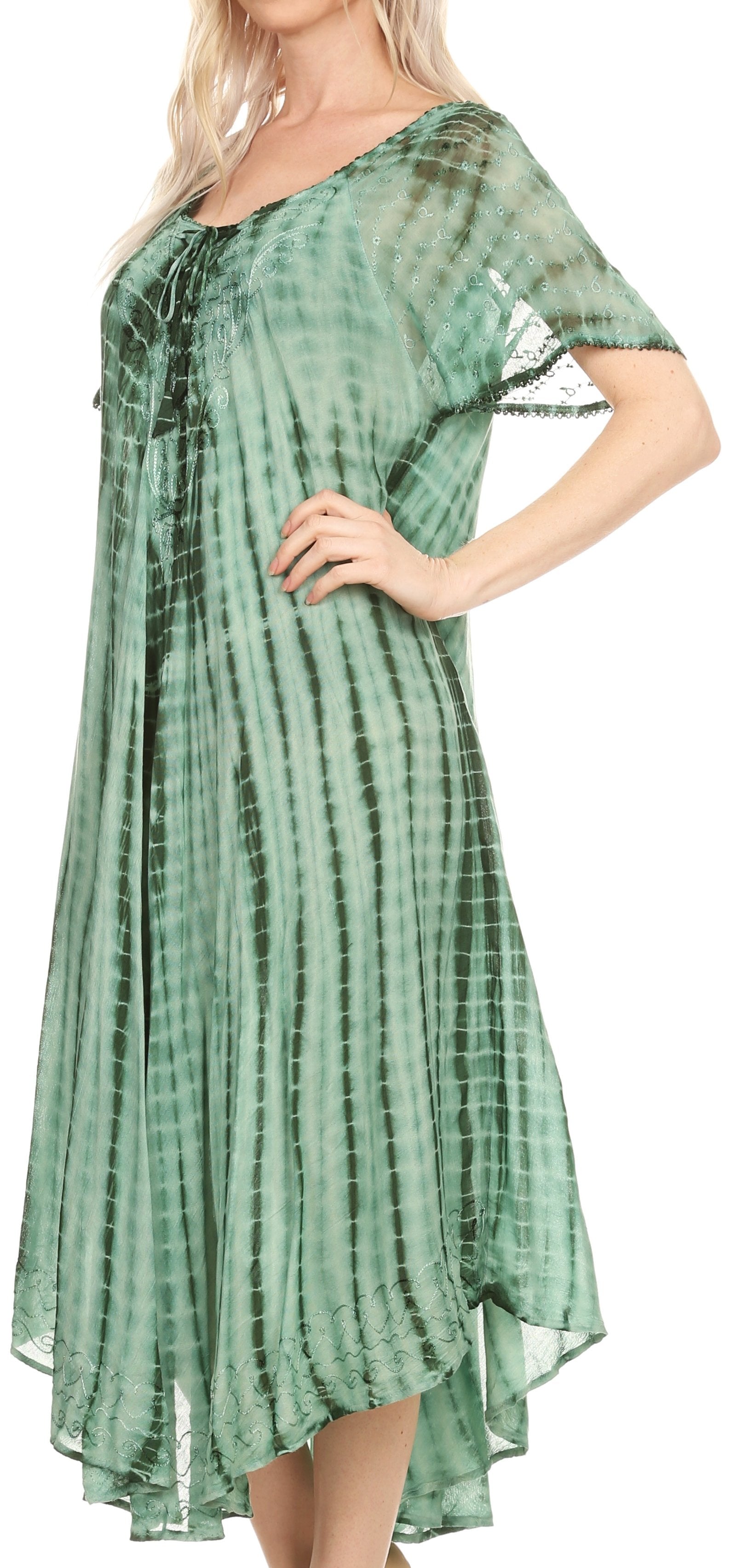 Green tie-dye dress worn by a model on a white background