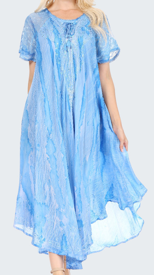 Woman wearing a light blue dress with short sleeves on a white background