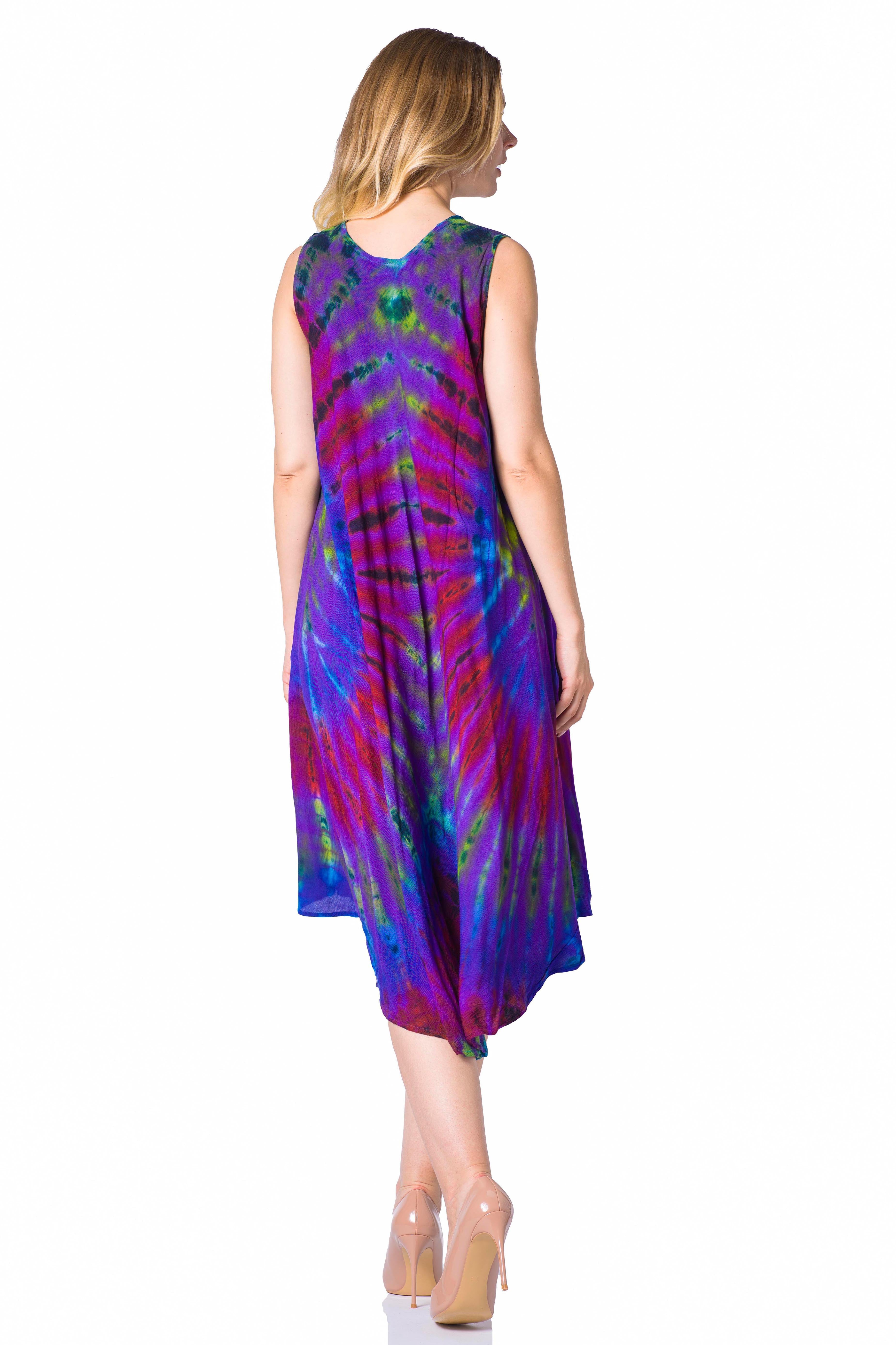 Woman wearing a colorful tie-dye dress on a white background