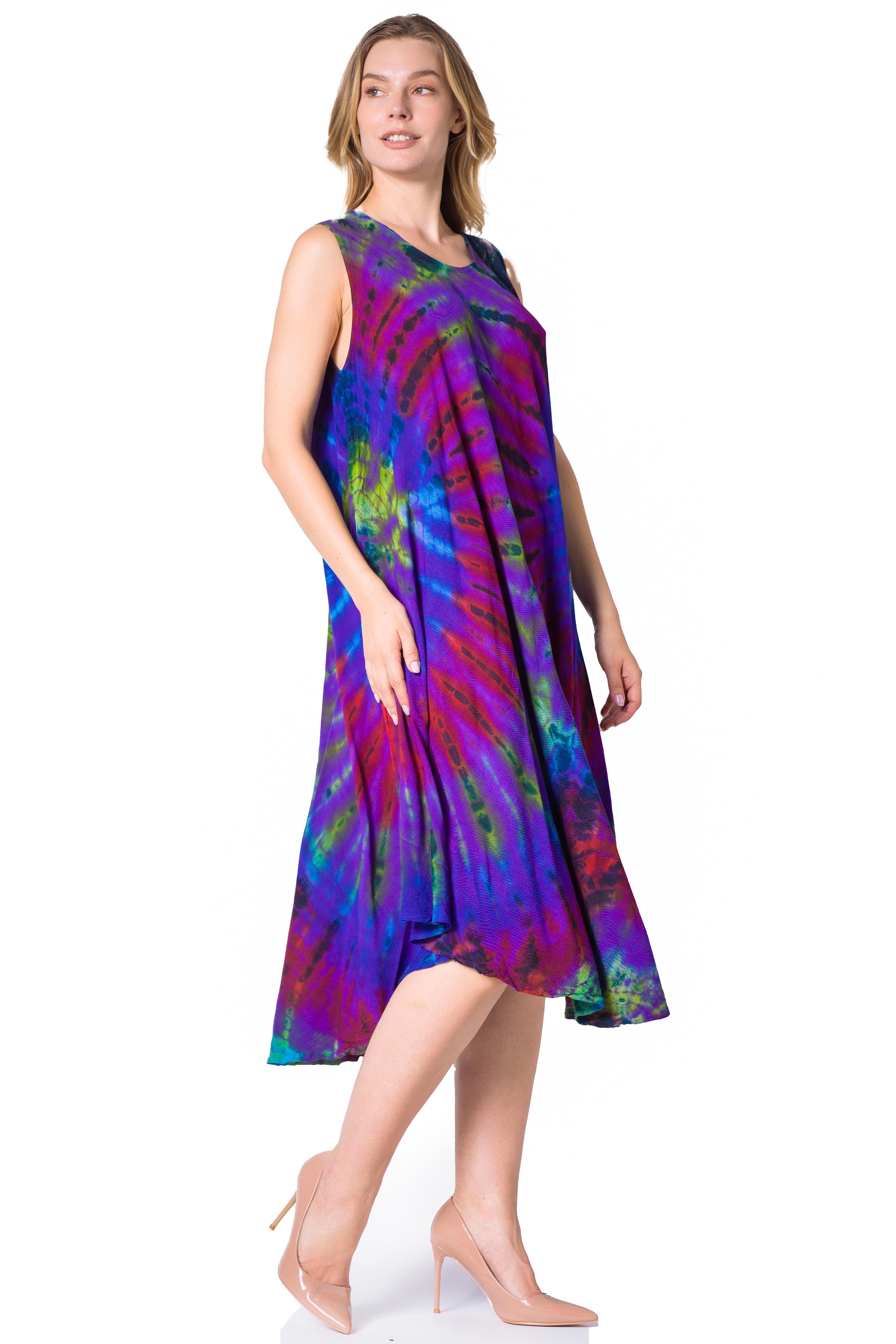 Woman wearing a tie-dye dress on a white background