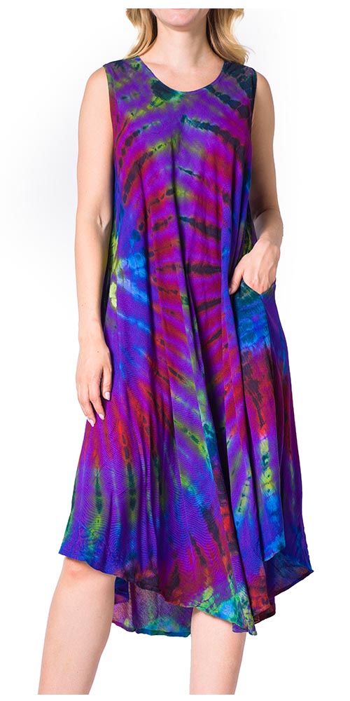 Multicolored tie-dye dress worn by a model on a white background