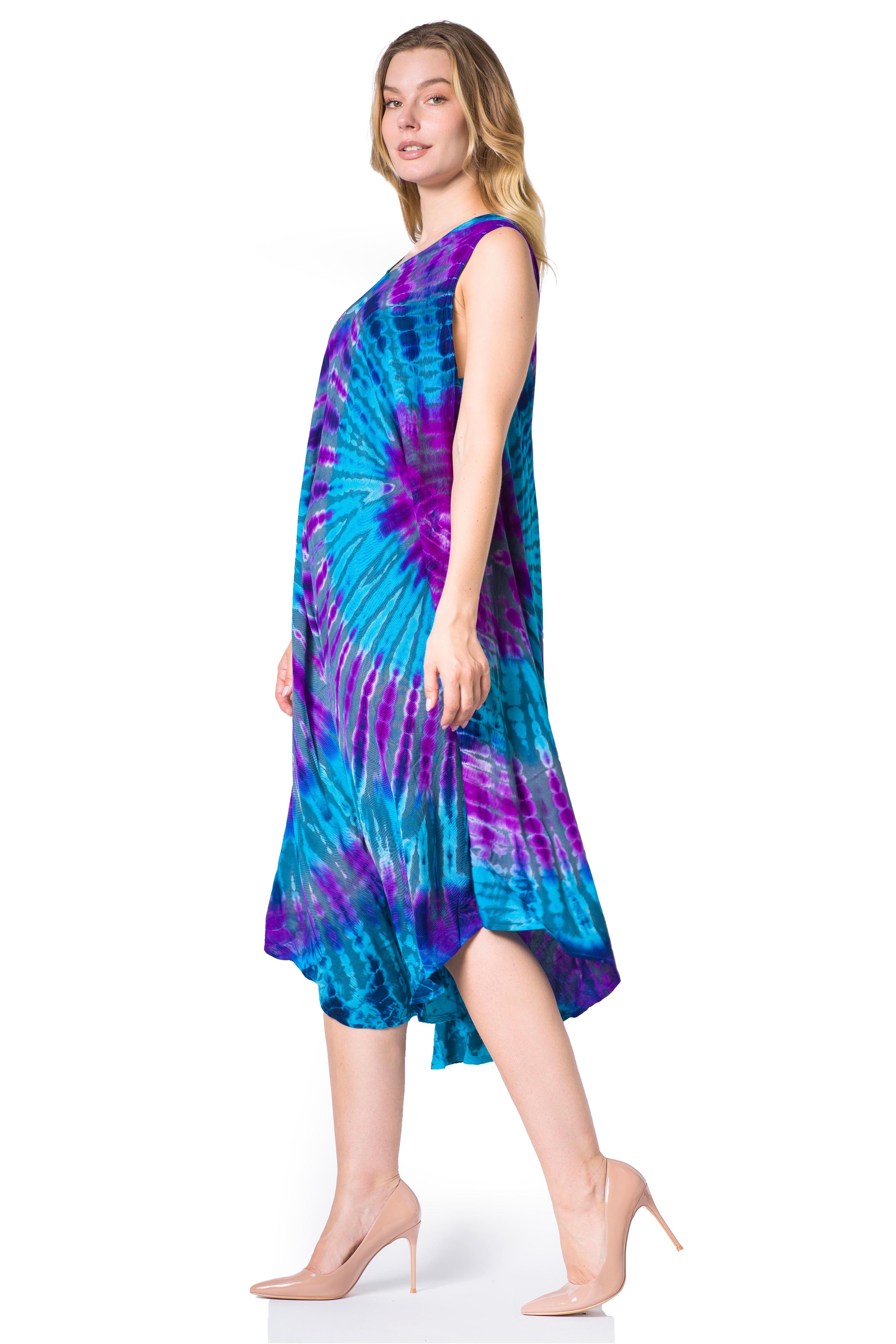 Woman wearing a tie-dye dress with blue and purple patterns on a white background