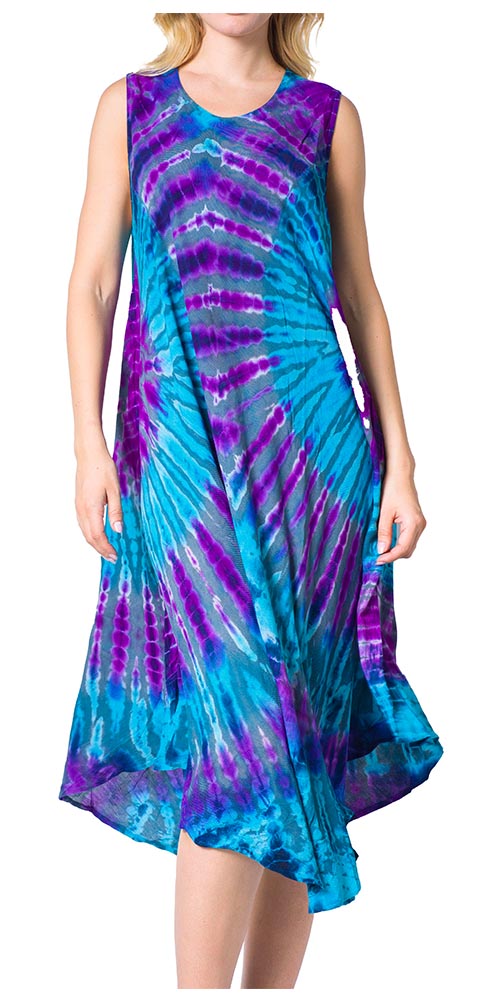 Woman wearing a tie-dye dress with blue and purple patterns on a white background