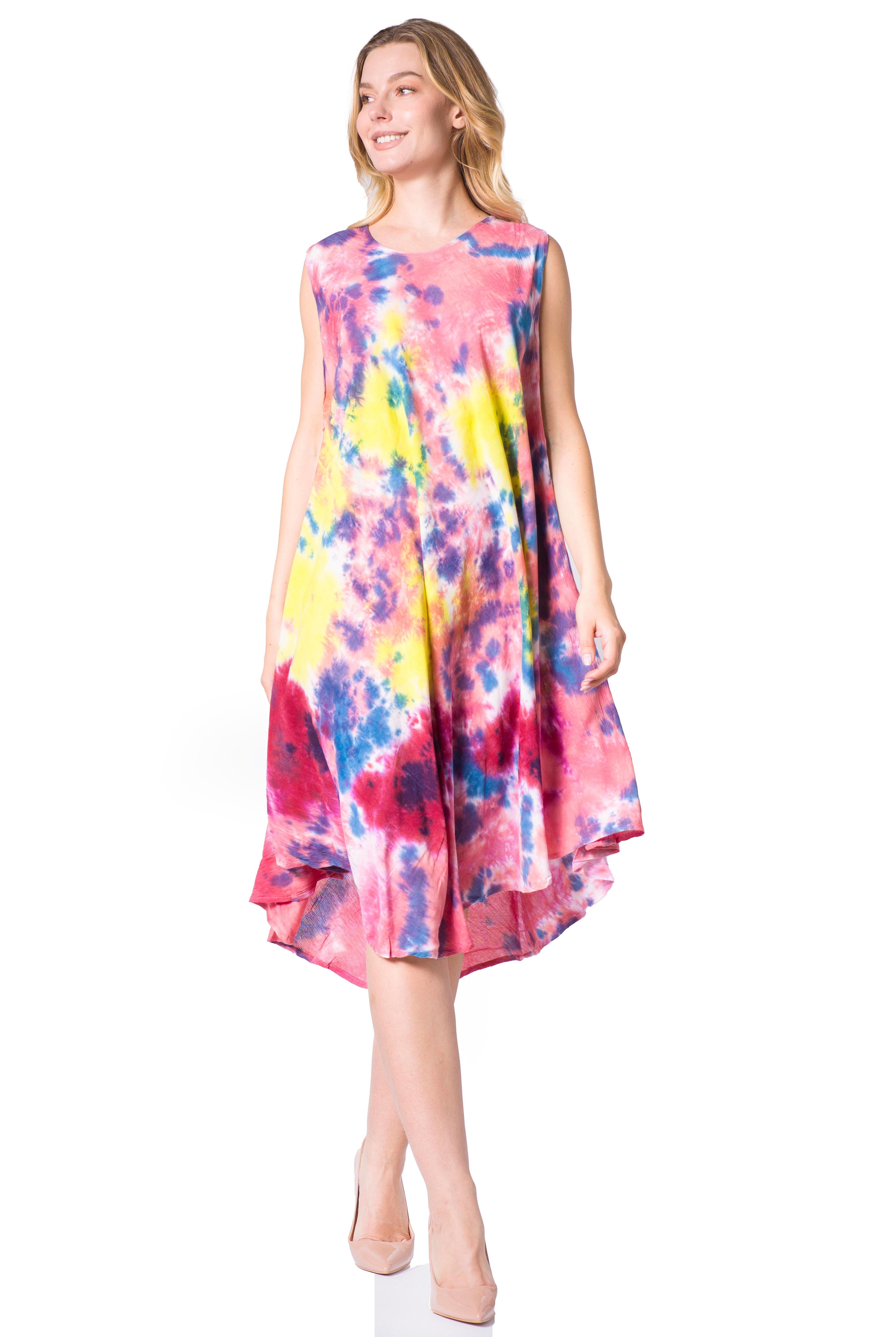Woman wearing a colorful tie-dye dress on a white background