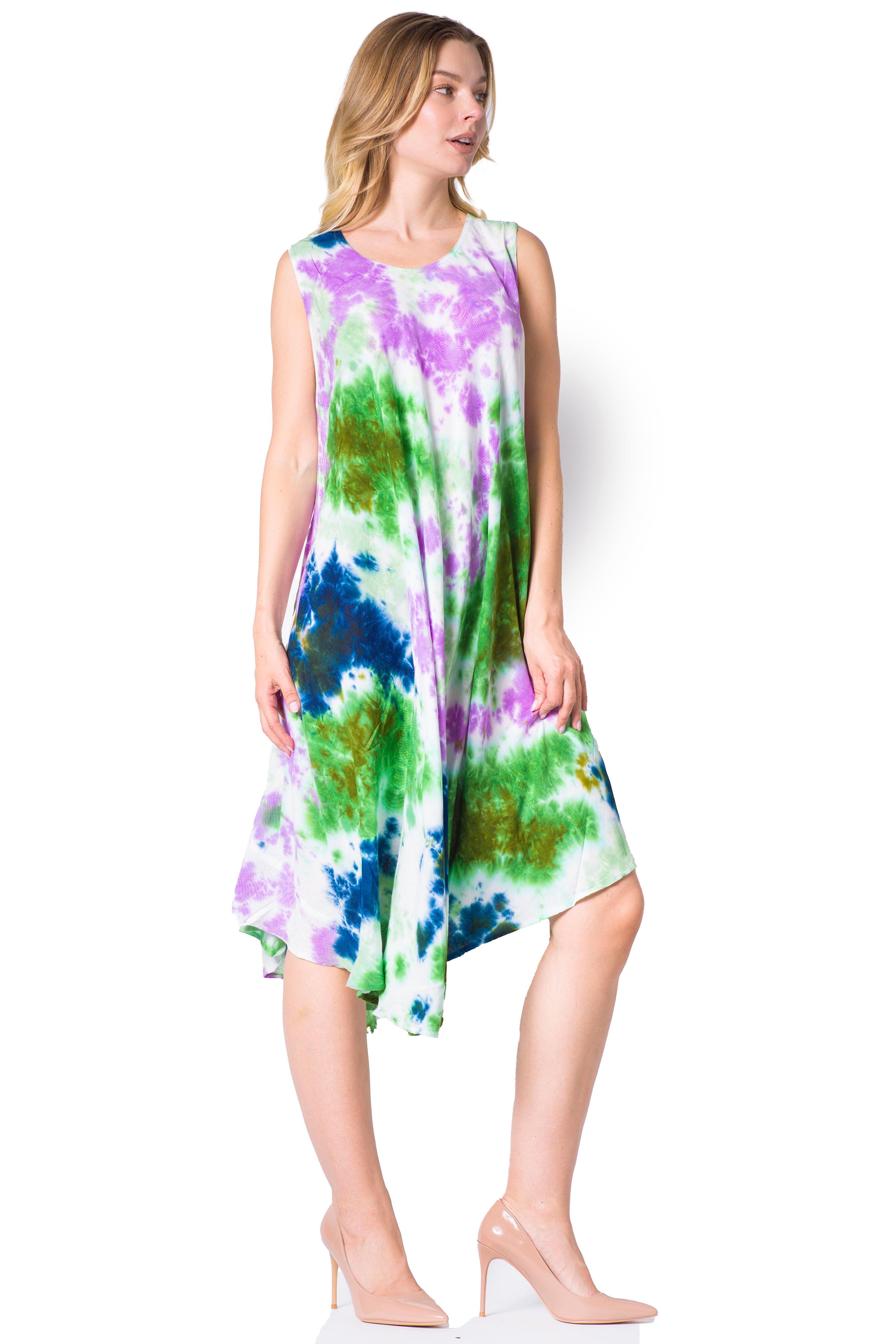 Woman wearing a colorful tie-dye dress on a white background
