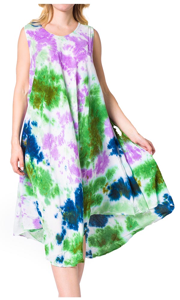 Woman wearing a sleeveless dress with a colorful tie-dye pattern on a white background