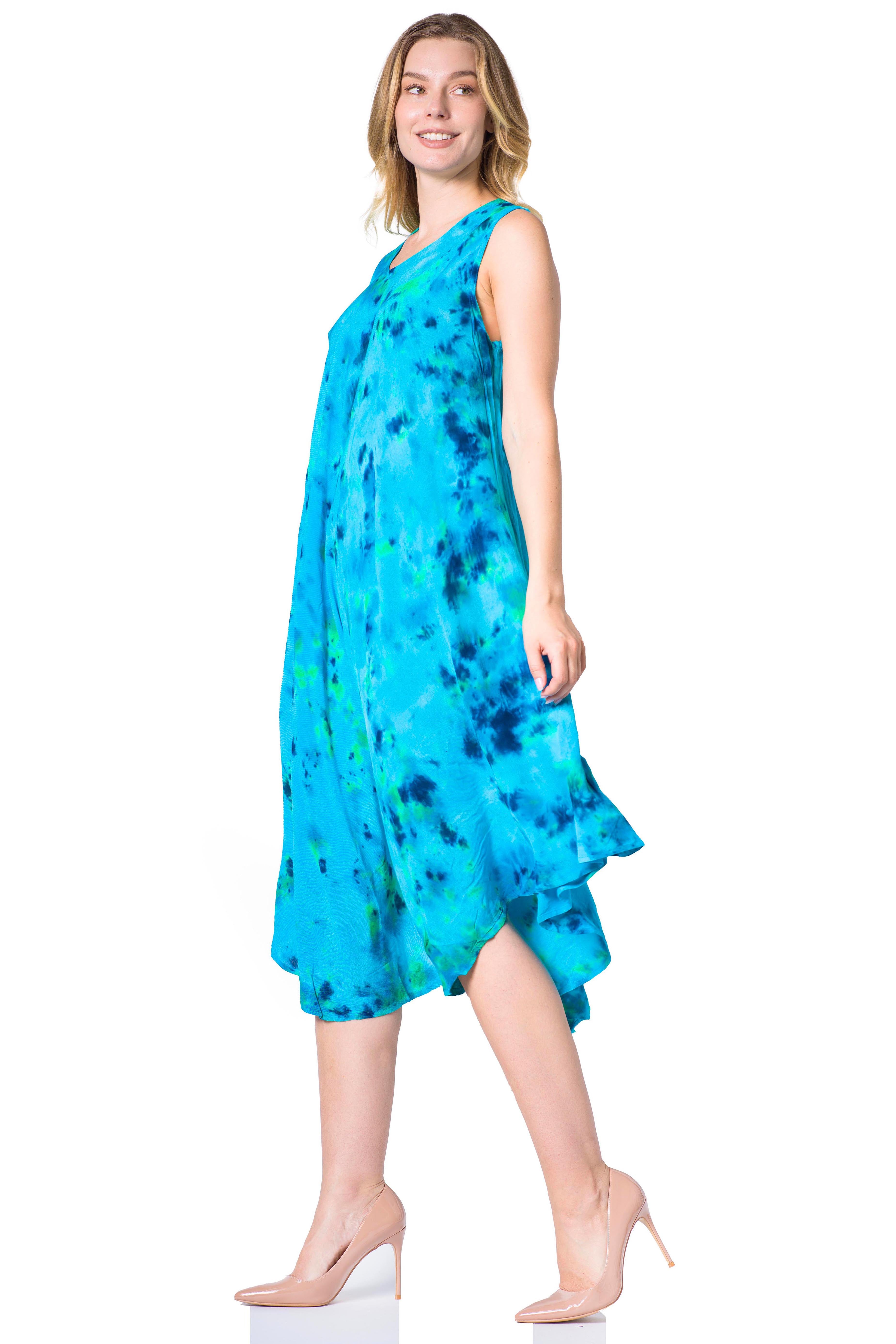 Woman wearing a blue tie-dye dress on a white background