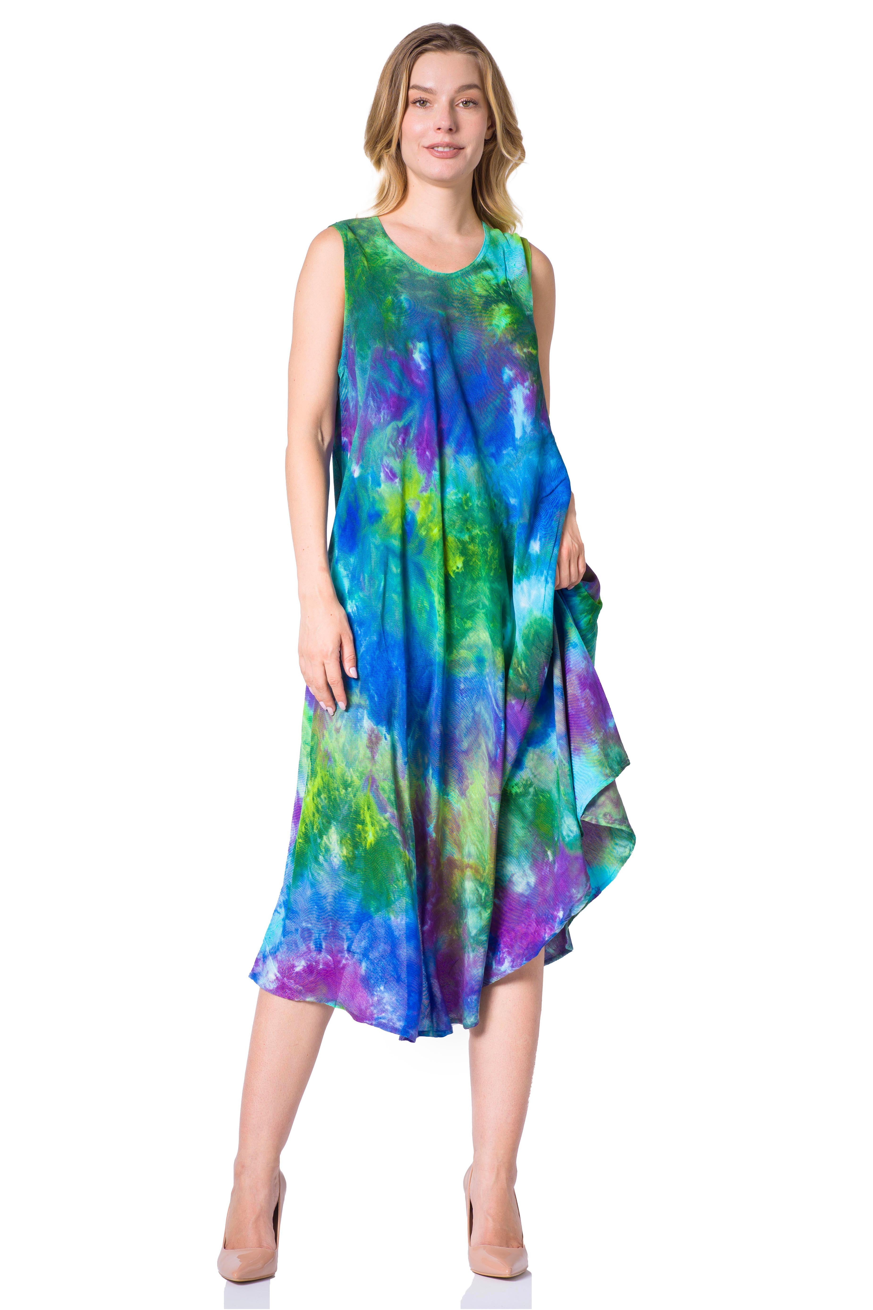 Woman wearing a colorful tie-dye dress on a white background