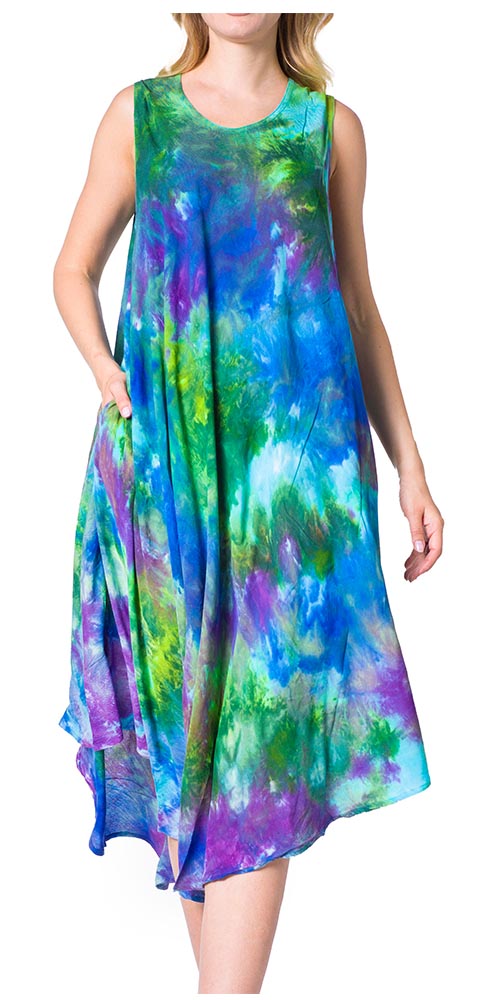Multicolored tie-dye dress worn by a model on a white background