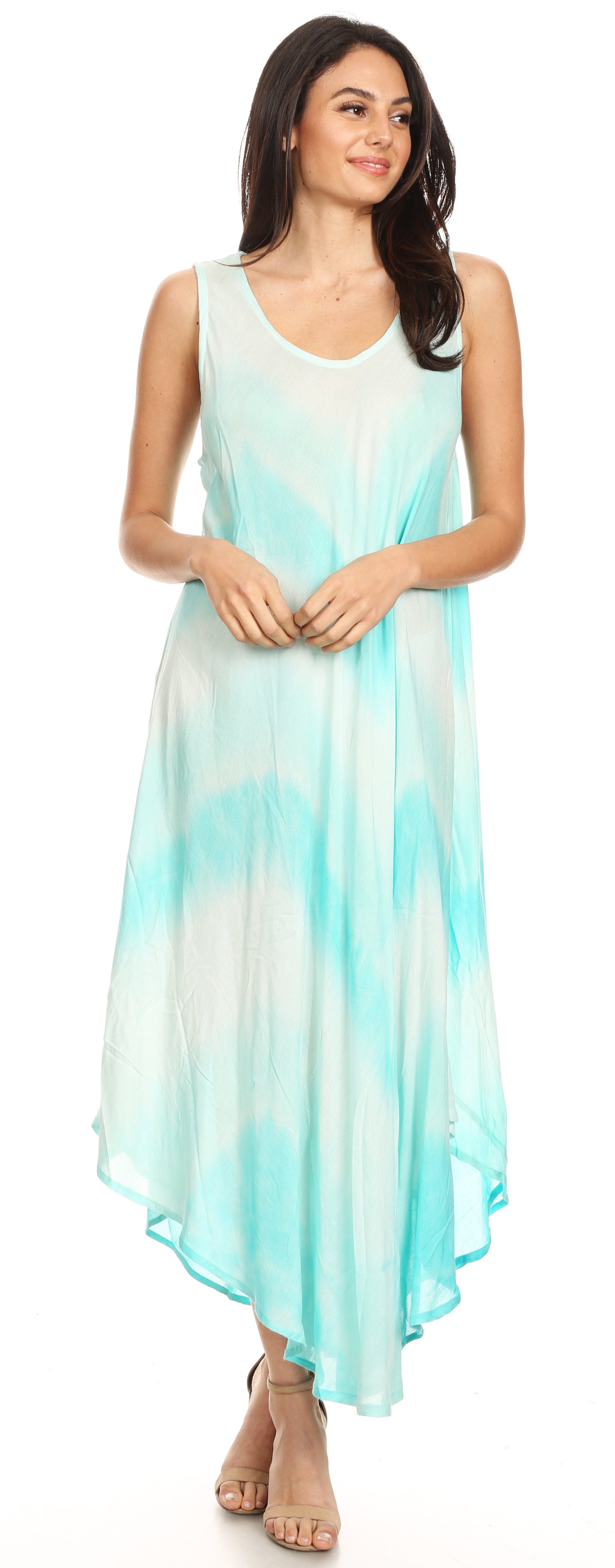 Woman wearing a sleeveless, light blue and white dress with a gradient effect.