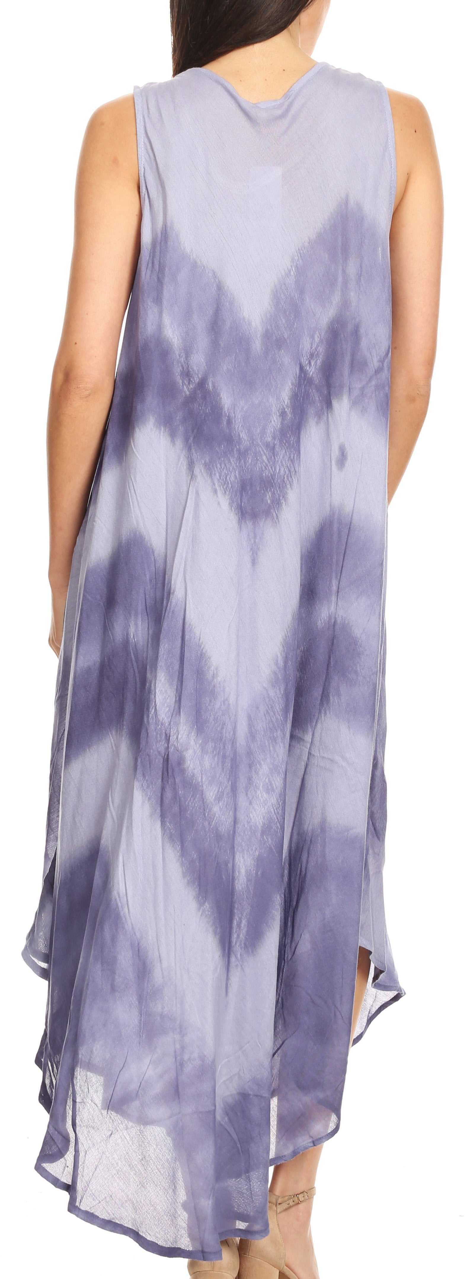 Woman wearing a sleeveless, tie-dye dress with a soft purple and white pattern.