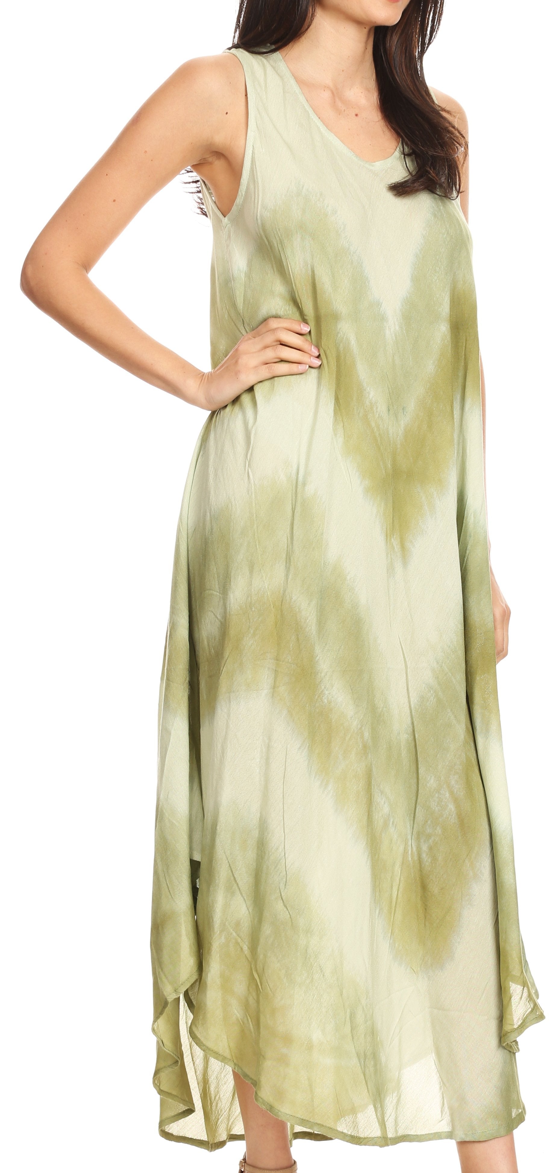 Woman wearing a light green dress on a white background