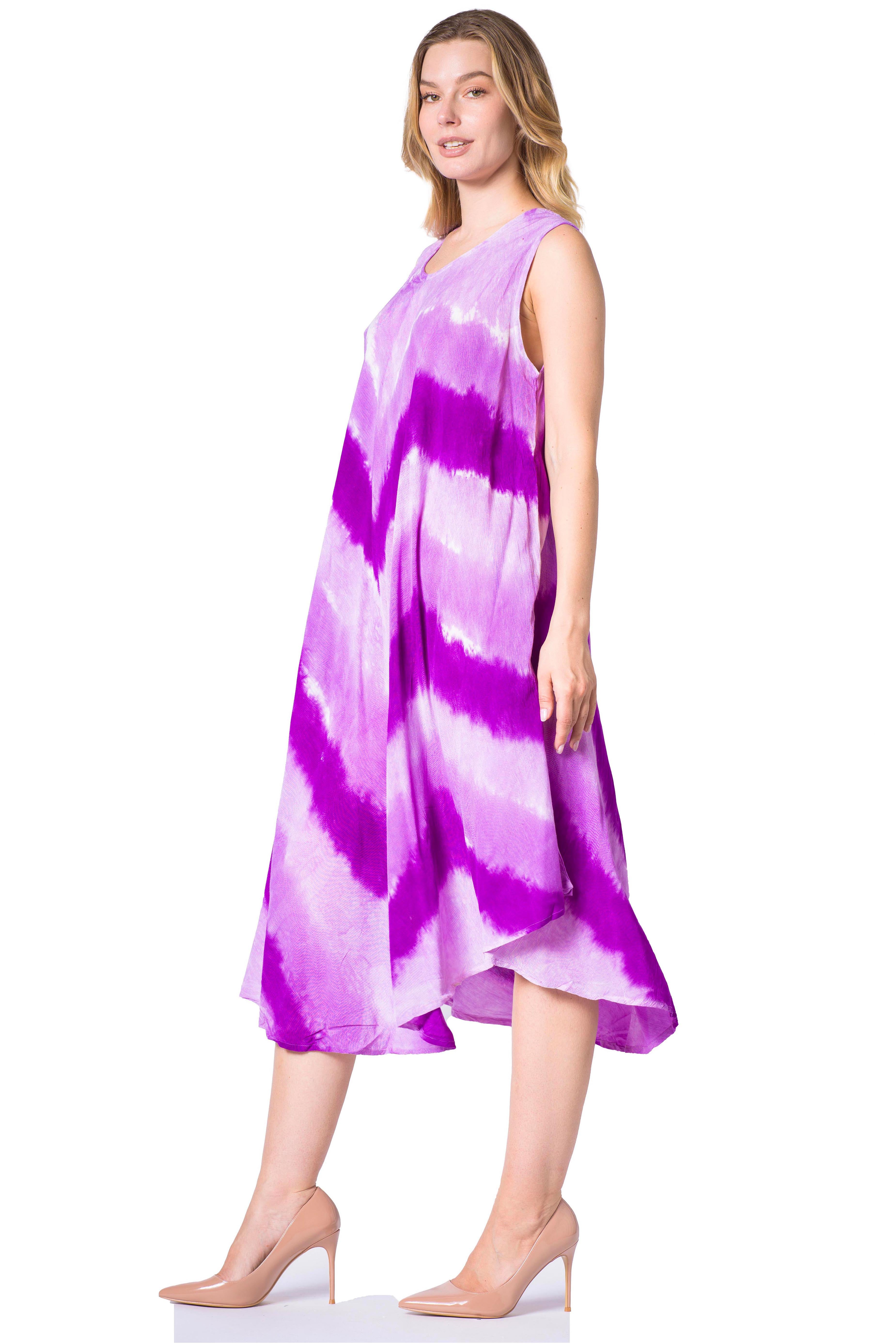 Woman wearing a purple tie-dye dress on a white background