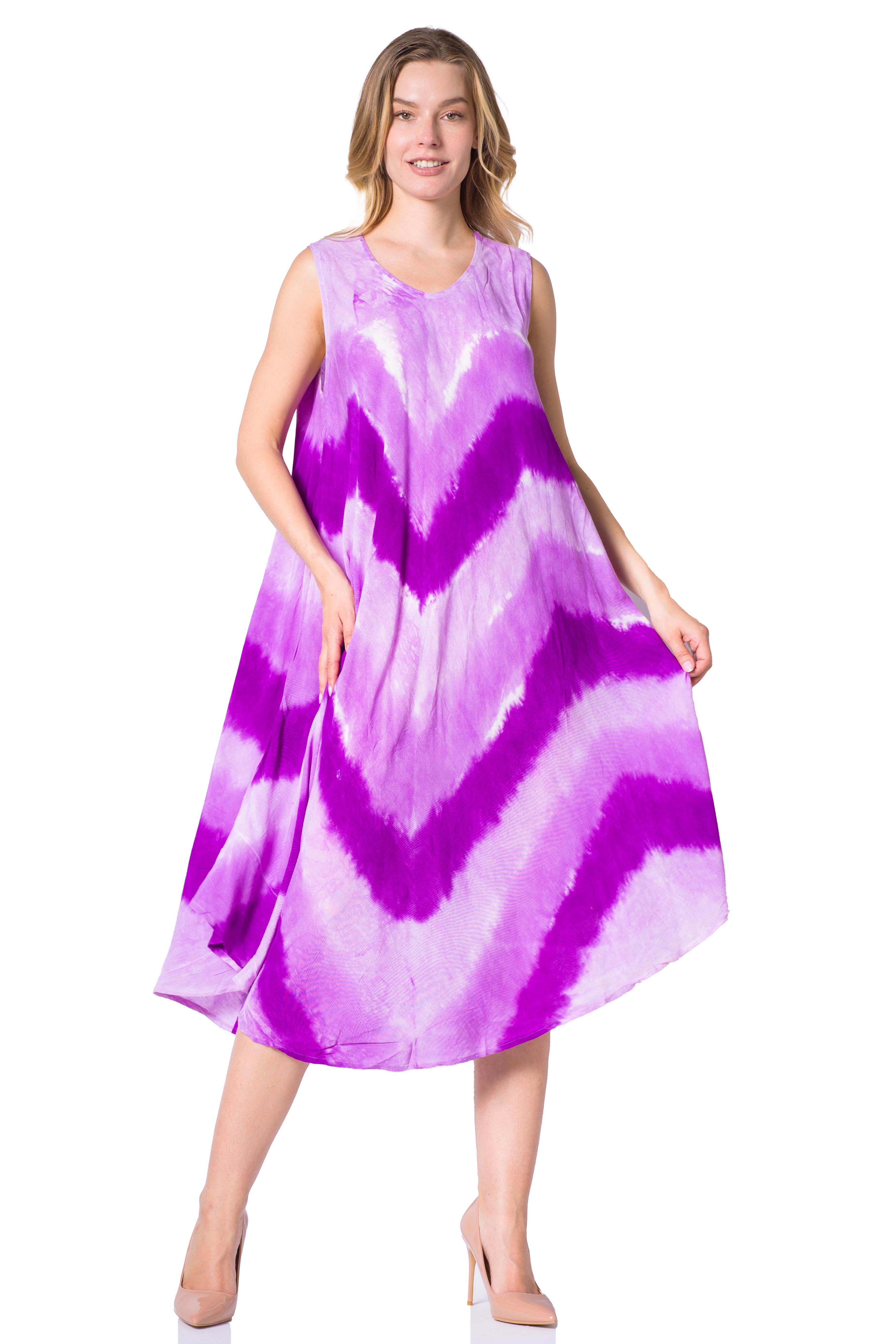 Woman wearing a purple and white tie-dye dress on a white background