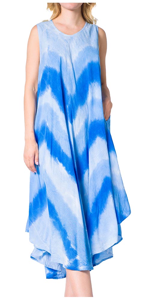 Woman wearing a blue and white tie-dye dress on a white background
