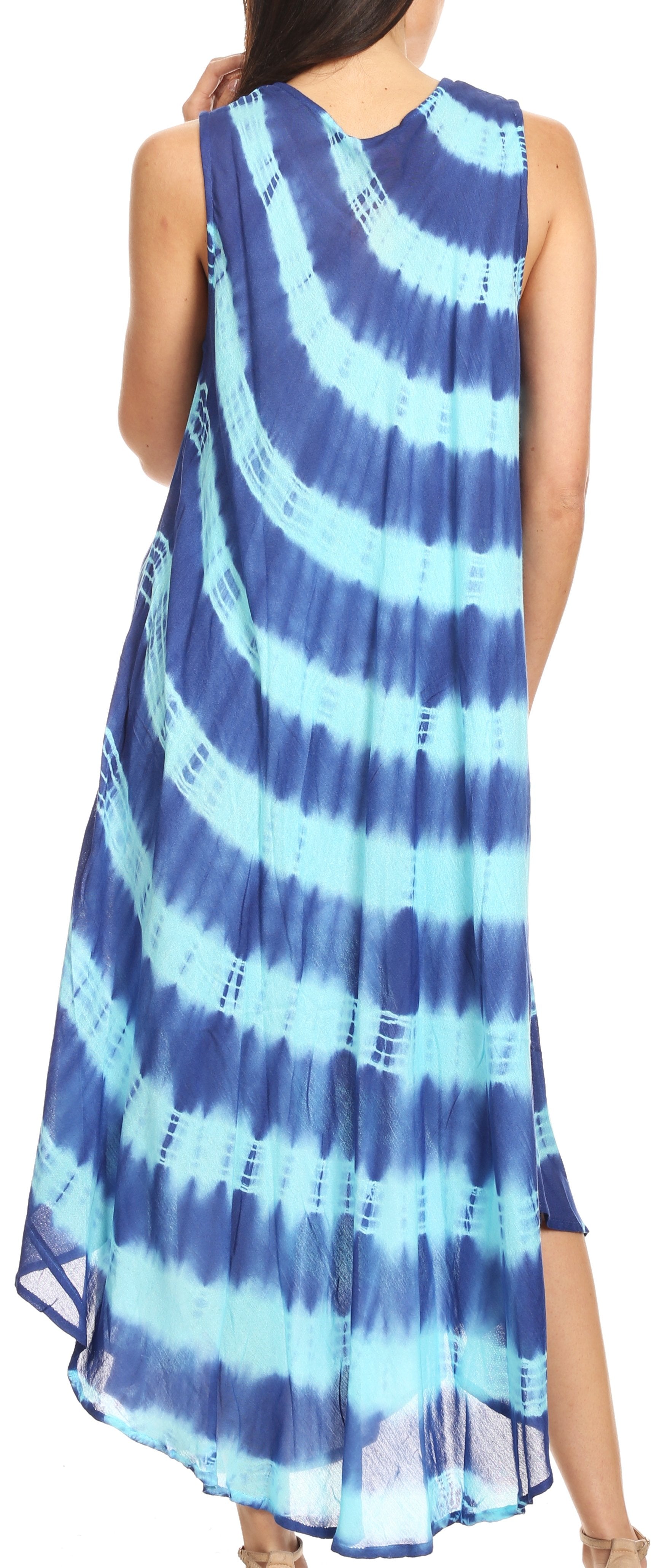 Woman wearing a blue and white tie-dye dress with a blurred background