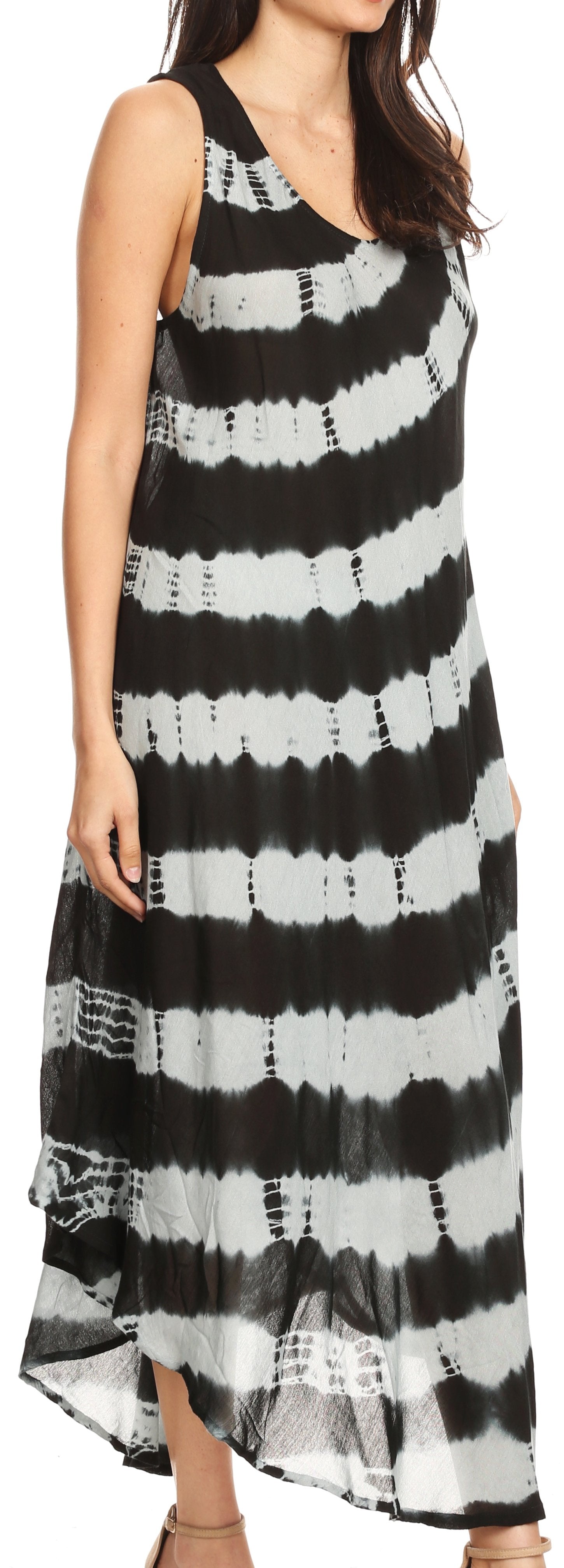 Woman wearing a black and white tie-dye dress.