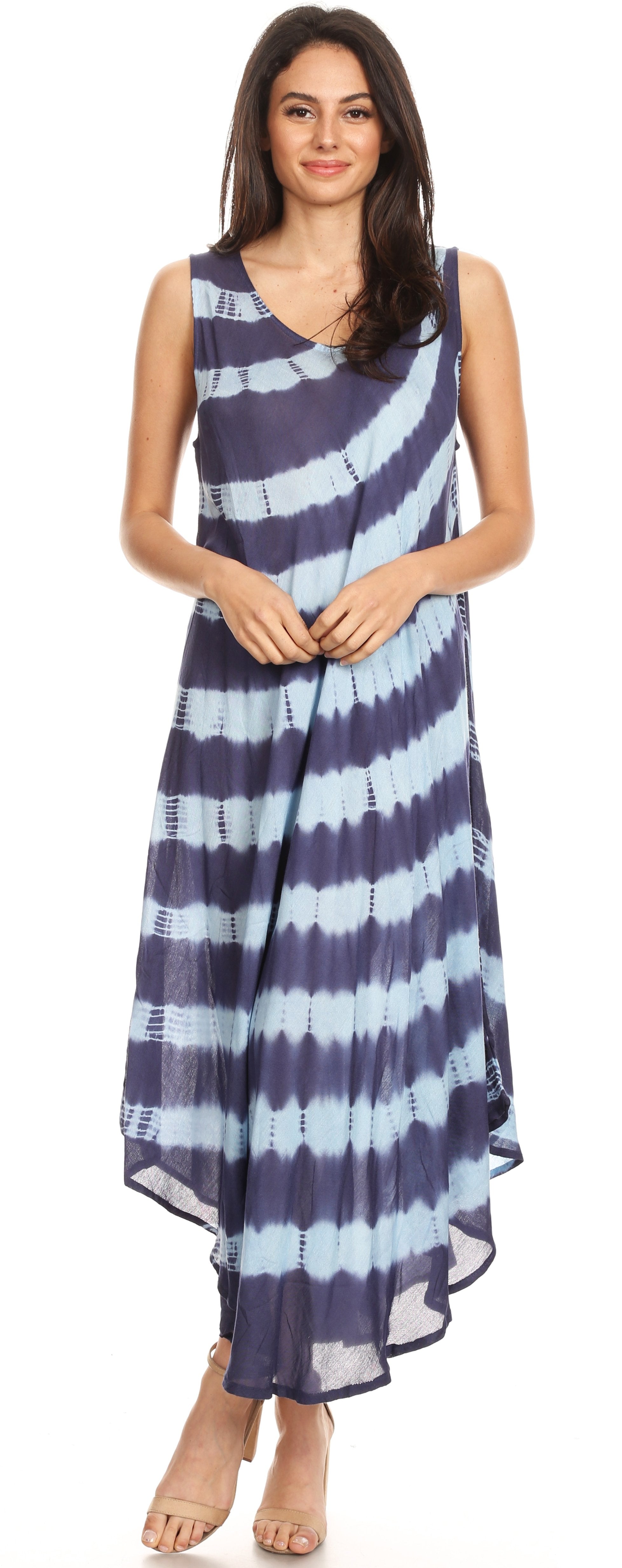 Woman wearing a blue and white striped dress on a plain background