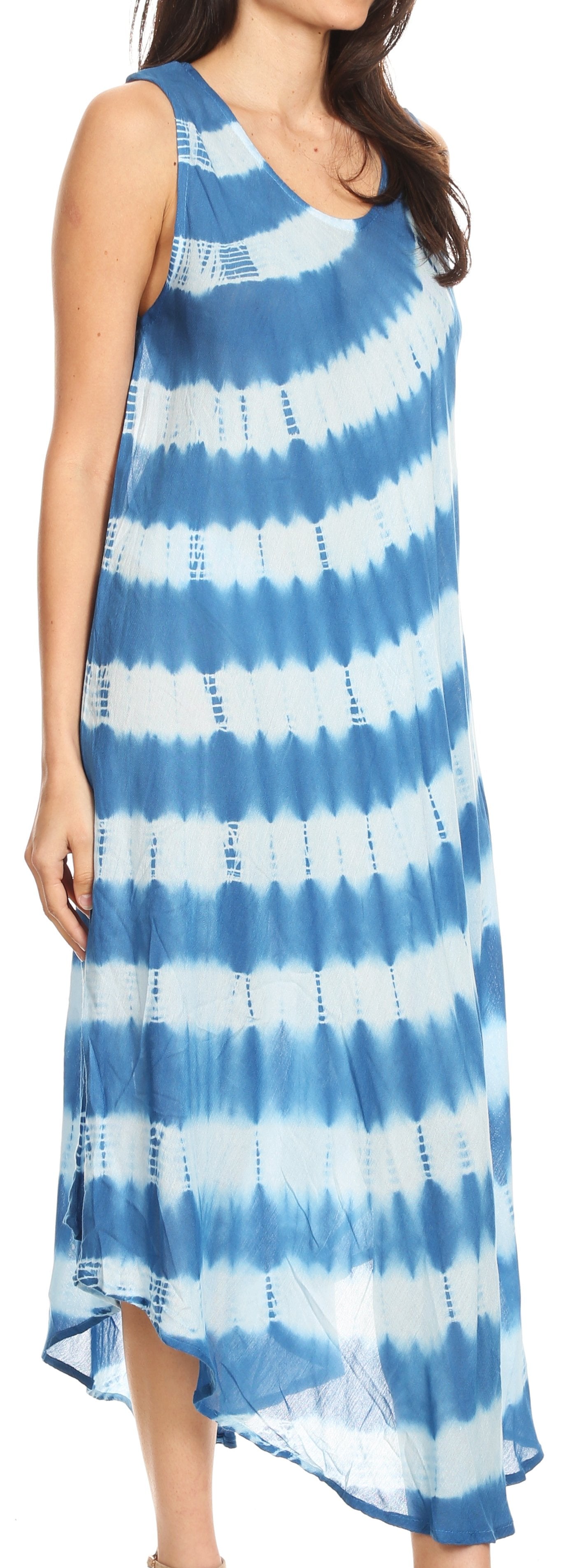 Woman wearing a blue and white tie-dye dress.