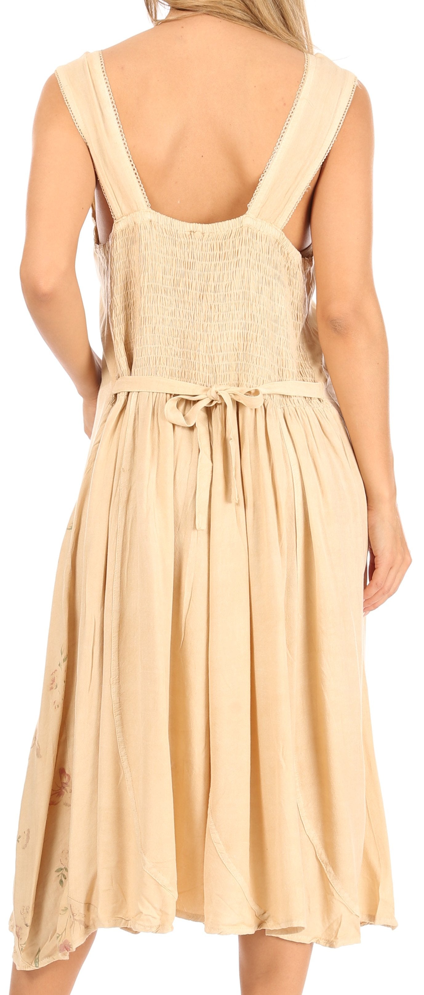 Beige dress with thin straps on a white background