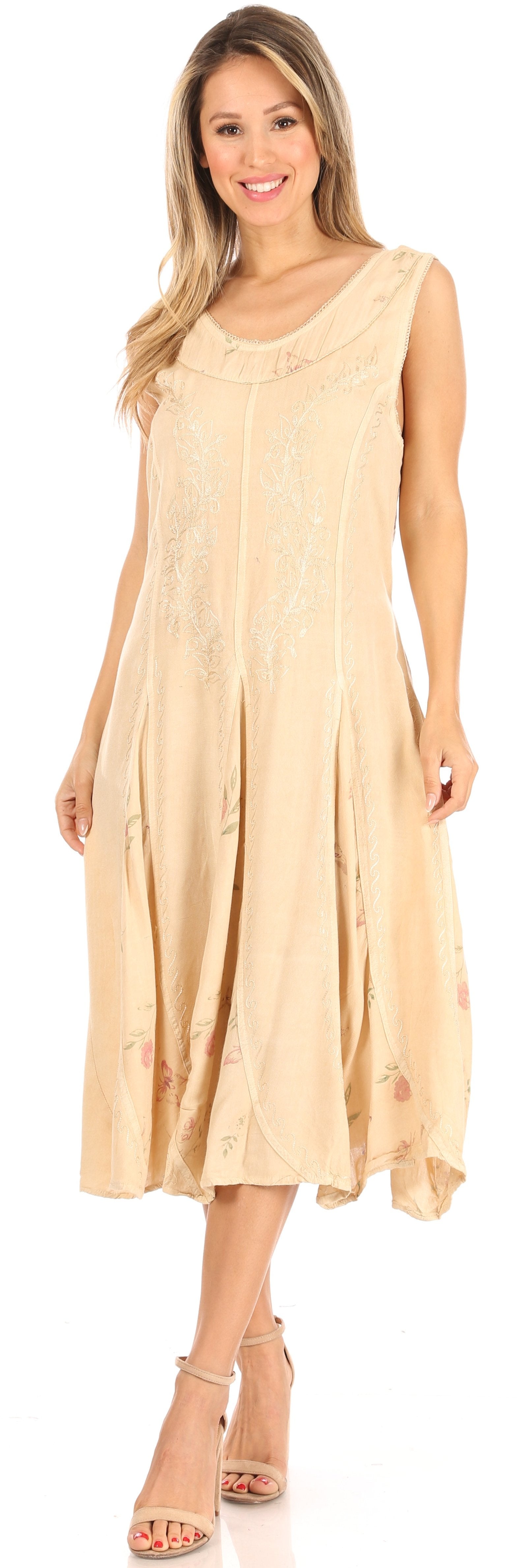 Woman wearing a beige sleeveless dress on a white background