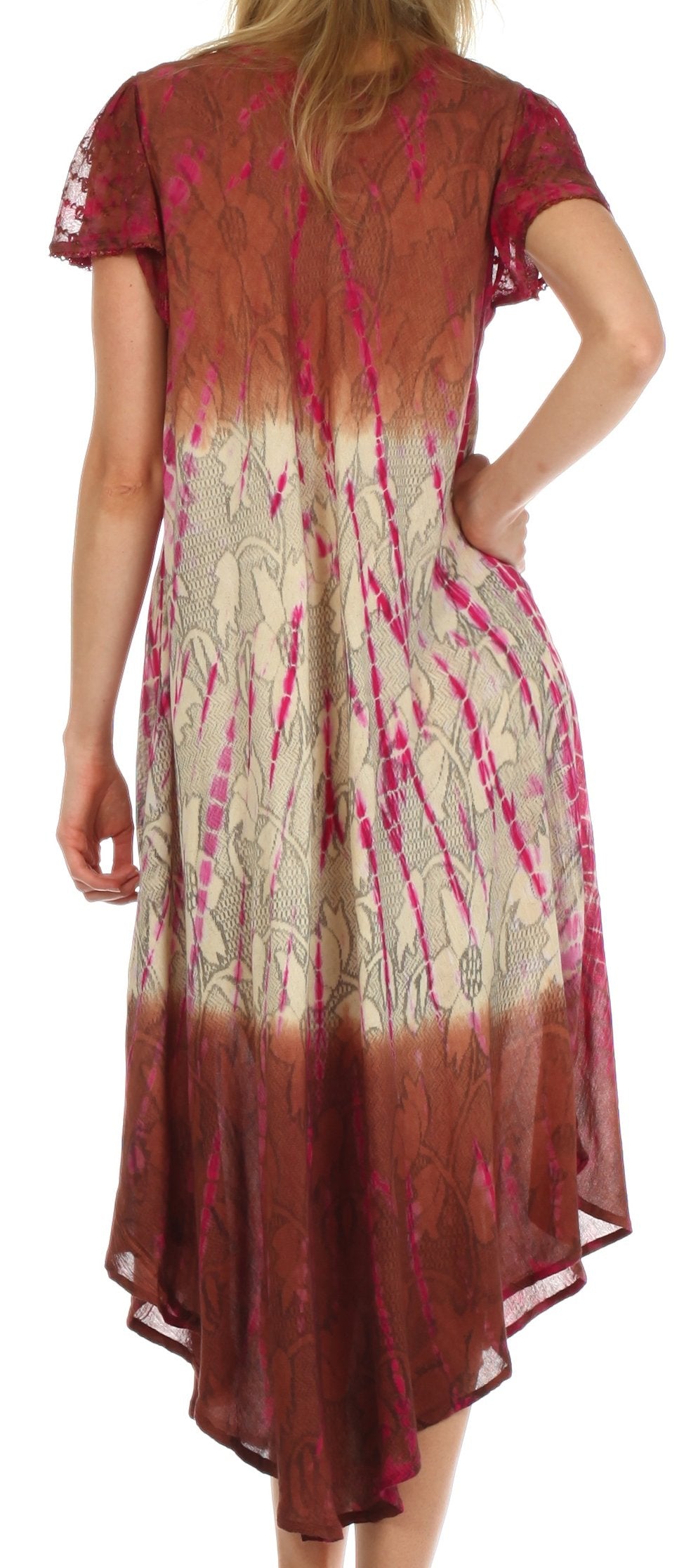 Woman wearing a long, patterned dress with a gradient design.