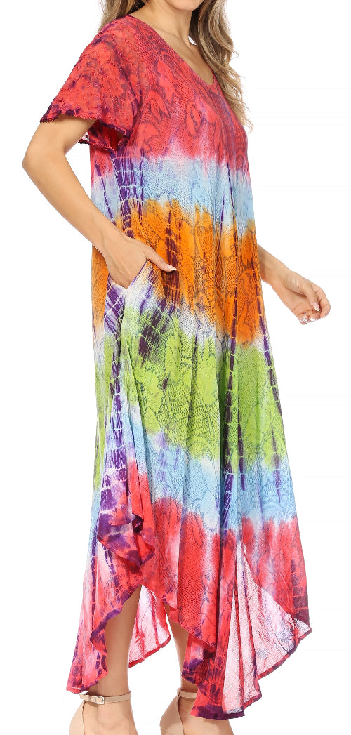 Multicolored tie-dye dress worn by a model on a white background
