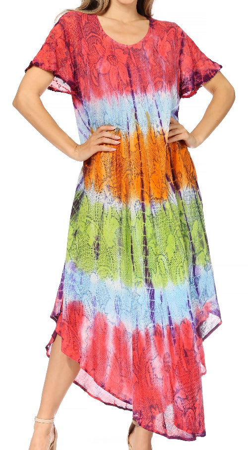 Multicolored tie-dye dress worn by a model on a white background
