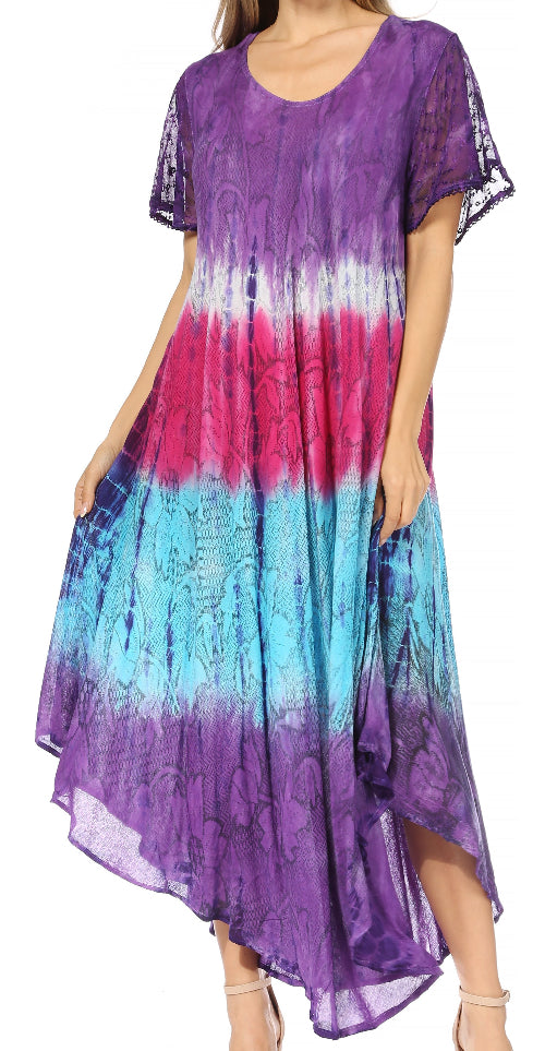 Woman wearing a tie-dye dress with purple, pink, and blue gradient on a white background