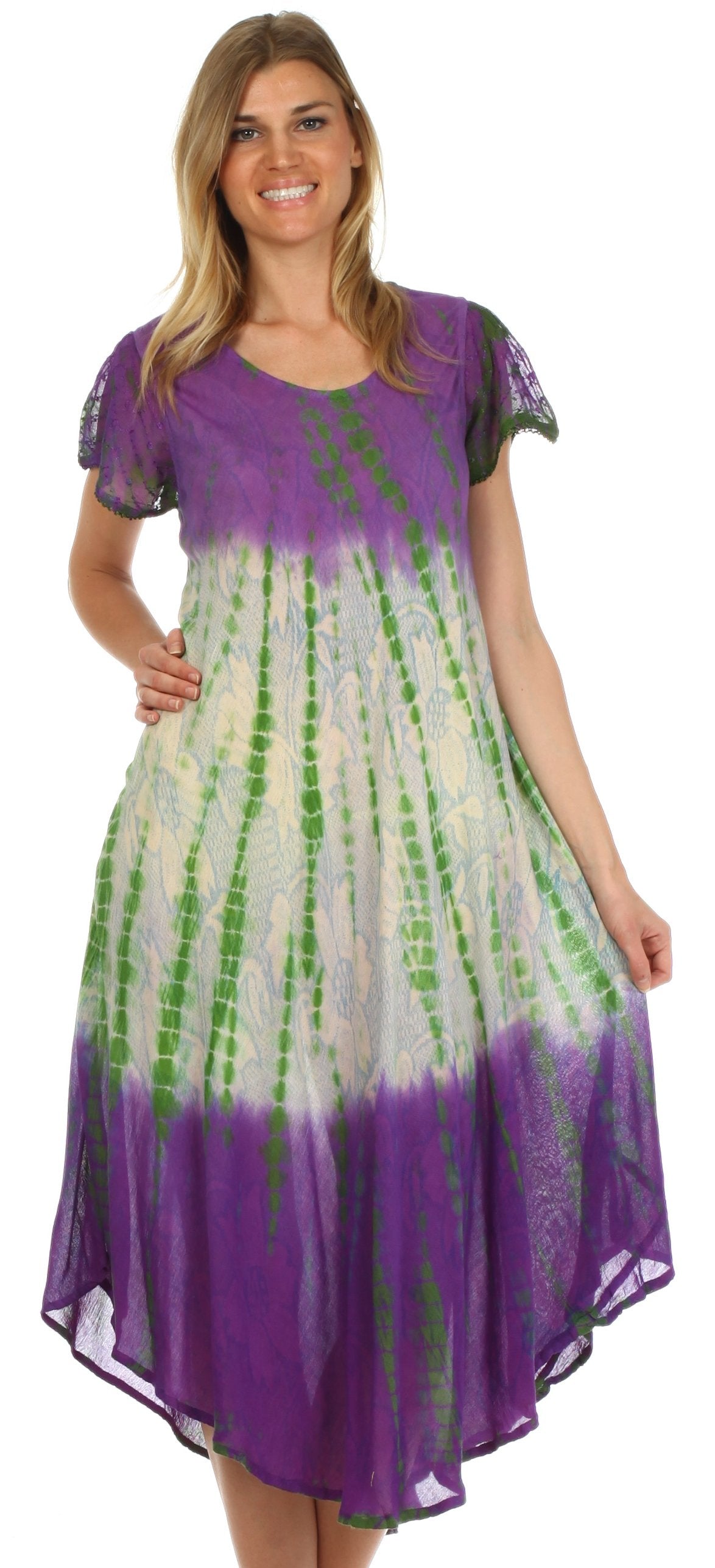 Woman wearing a purple and green tie-dye dress on a white background