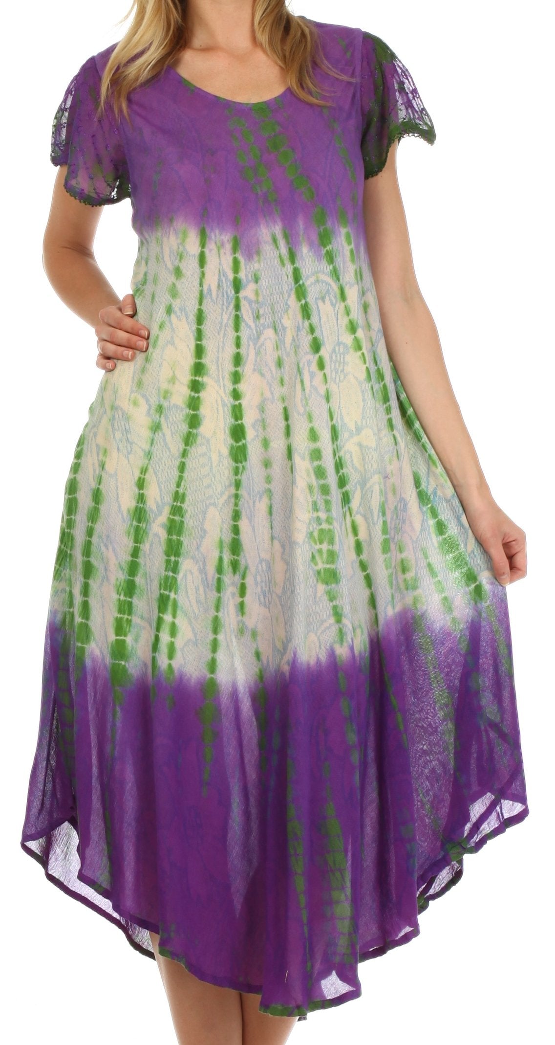 Woman wearing a purple and green tie-dye dress on a white background