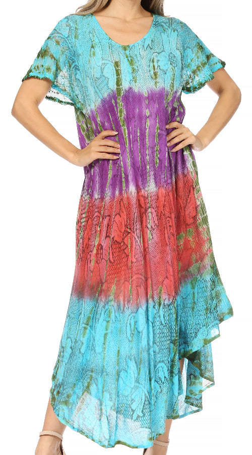 Multicolored tie-dye dress worn by a model on a white background