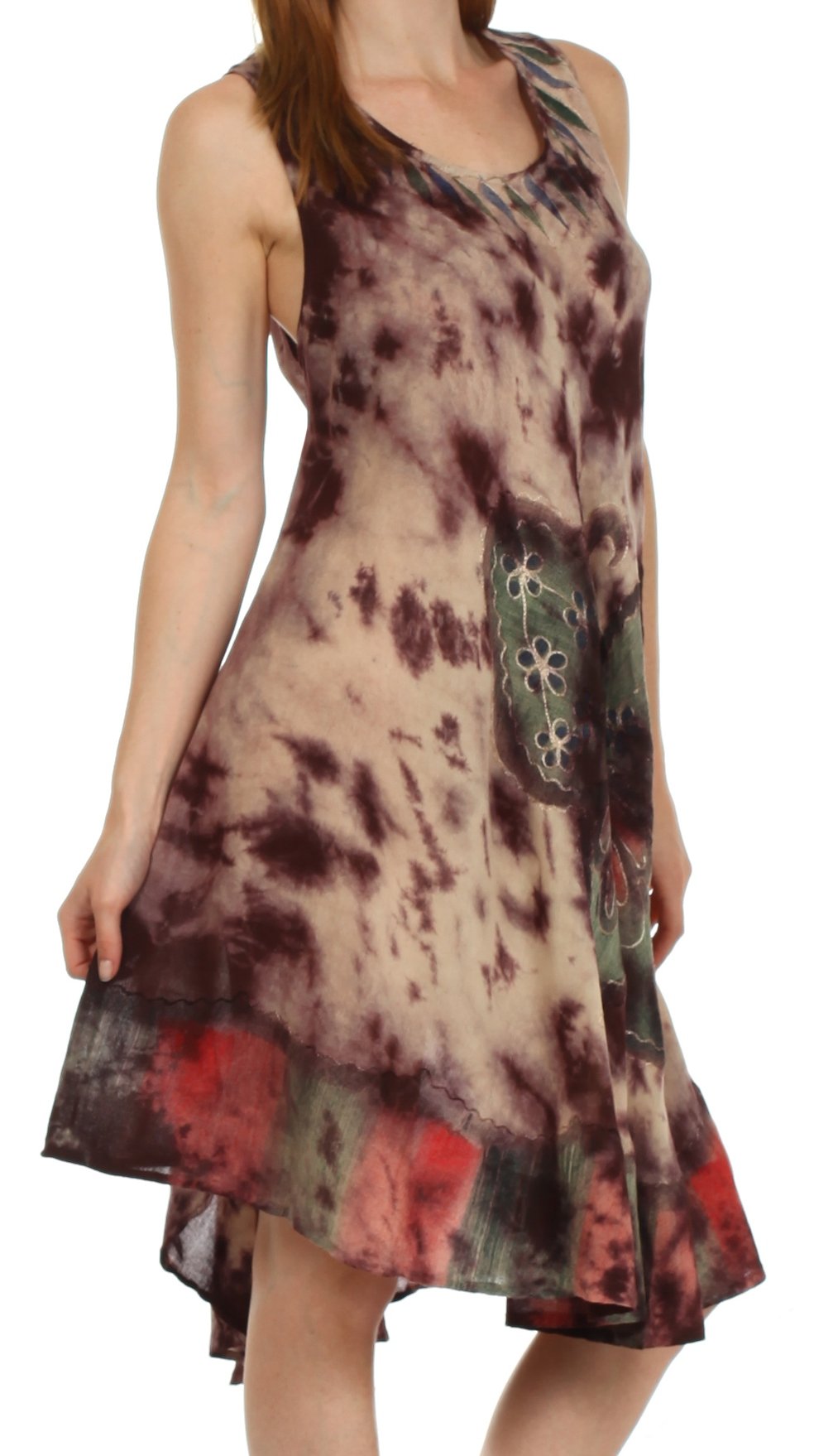 Woman wearing a tie-dye dress with floral patterns on a white background