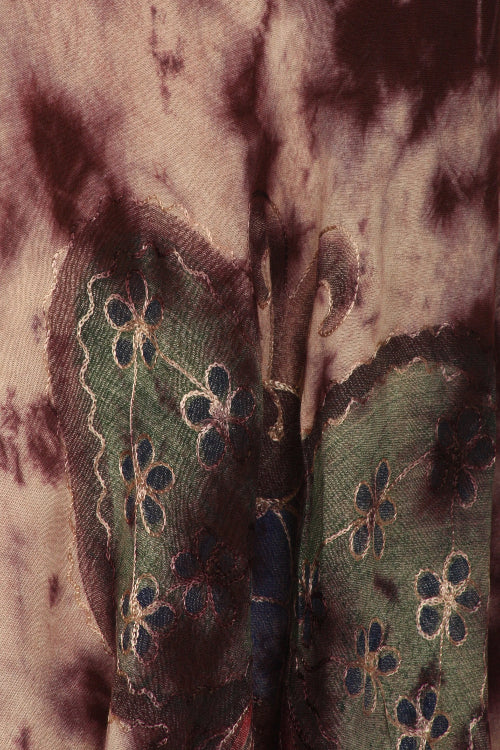Close-up of a butterfly with detailed wings on a textured background