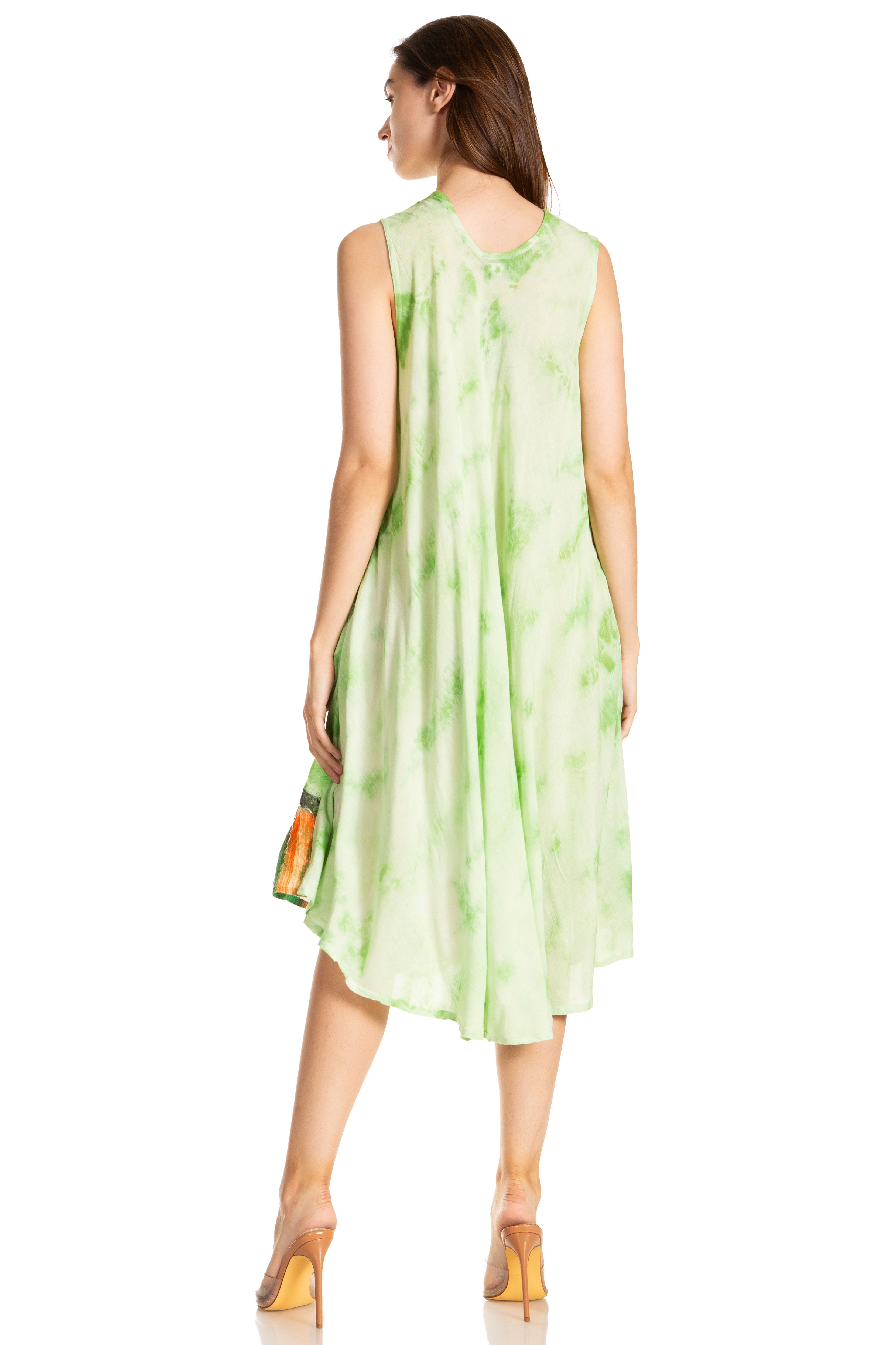 Woman wearing a light green sleeveless dress with a subtle pattern on a white background