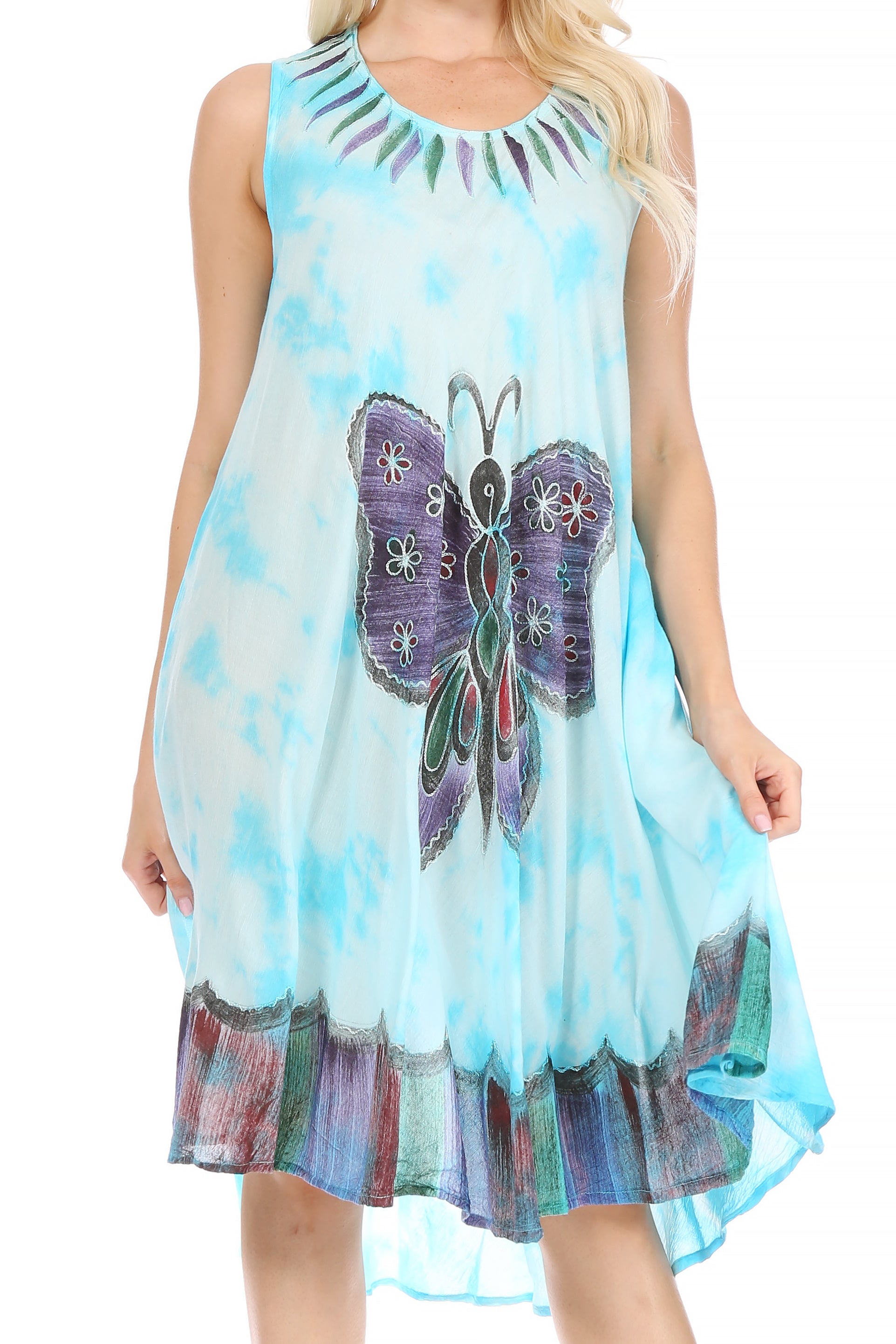Woman wearing a sleeveless dress with a butterfly design on a white background