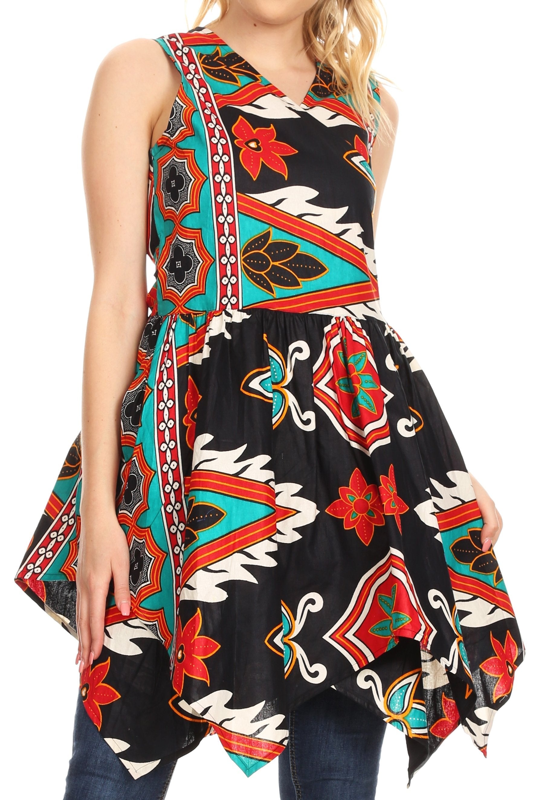 Woman wearing a colorful patterned dress with a white background