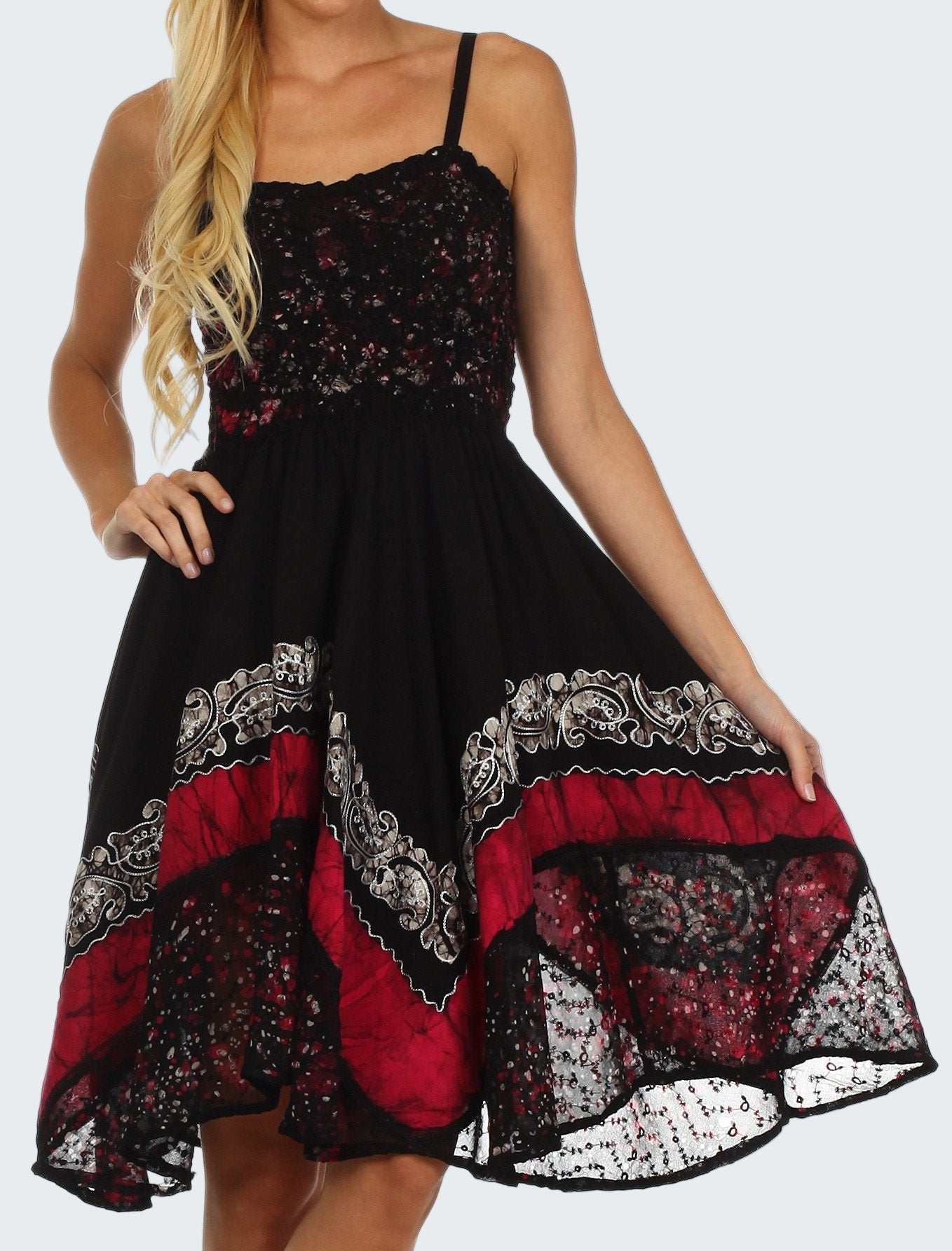 Black dress with red and white patterns on a white background