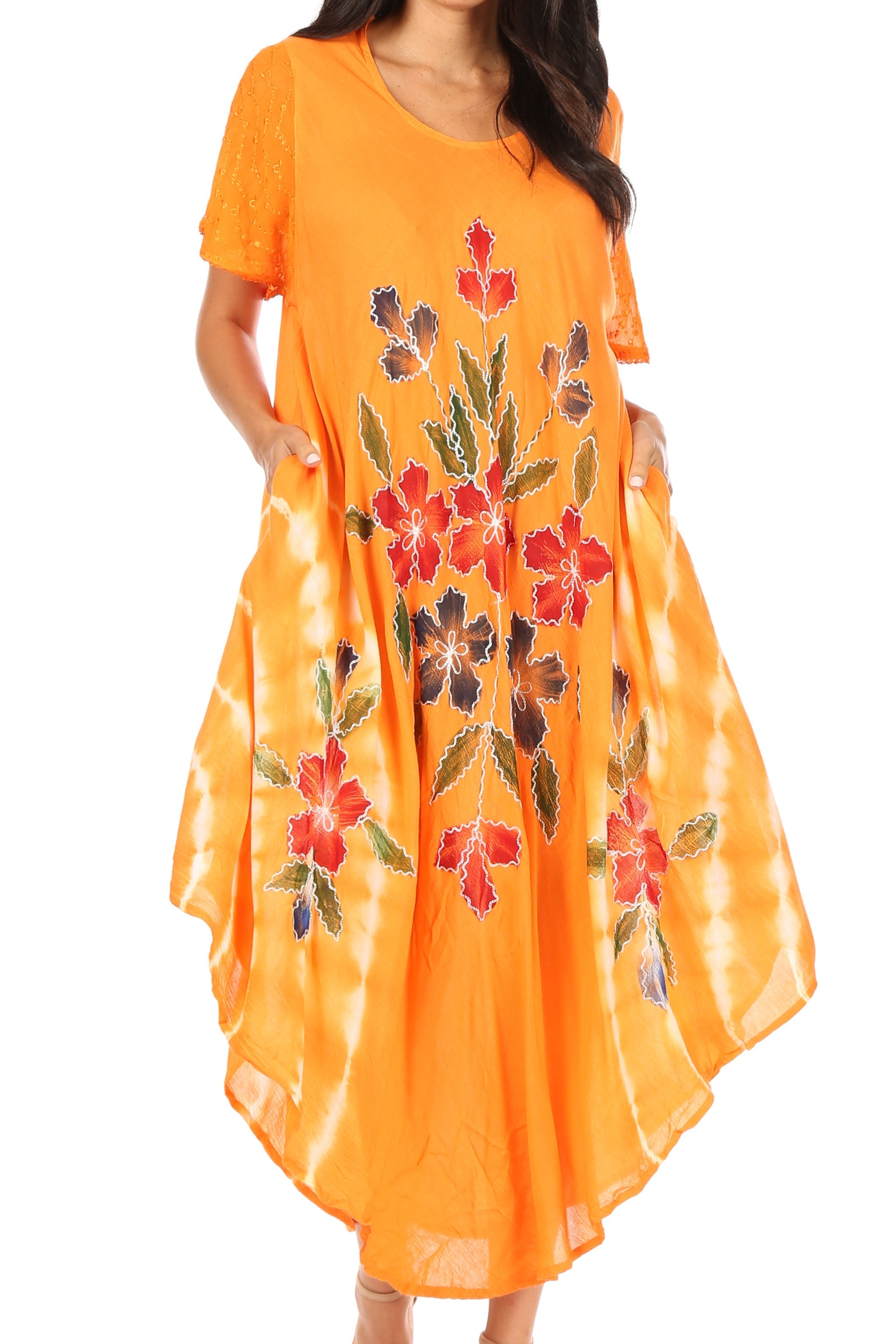 Orange dress with floral embroidery on a white background