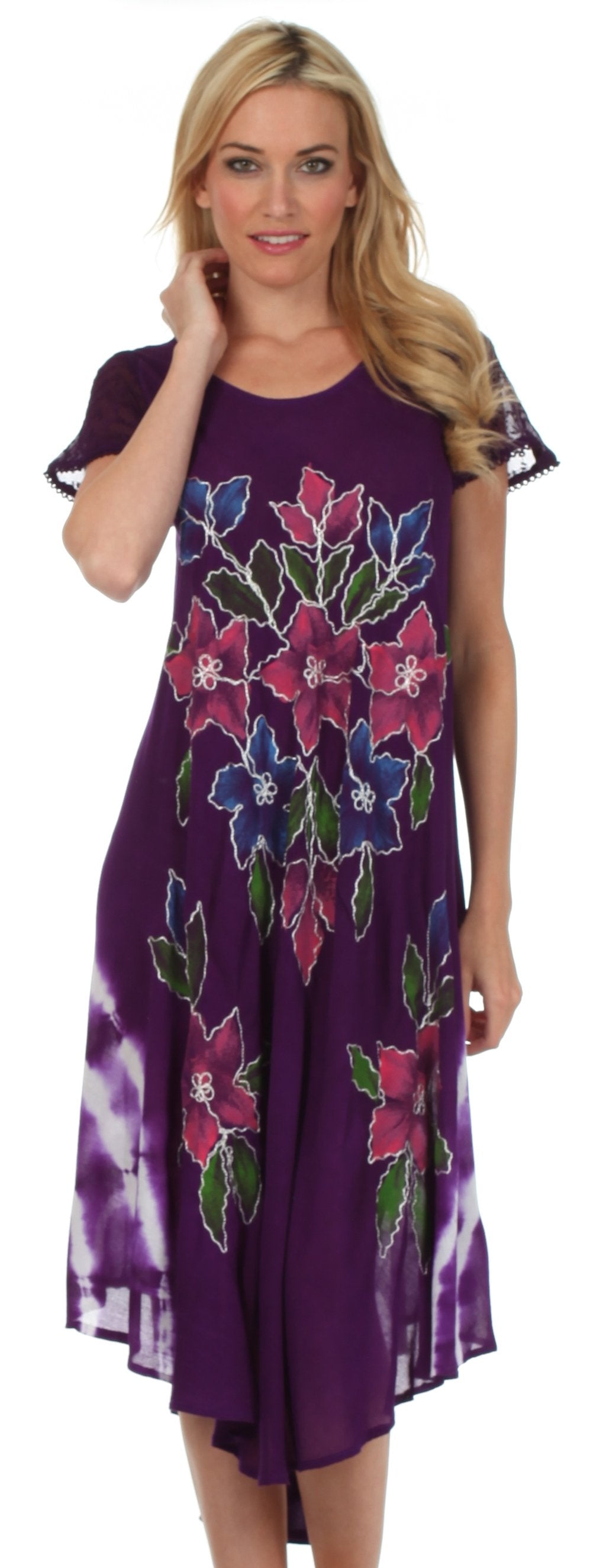Woman wearing a purple dress with floral patterns on a white background