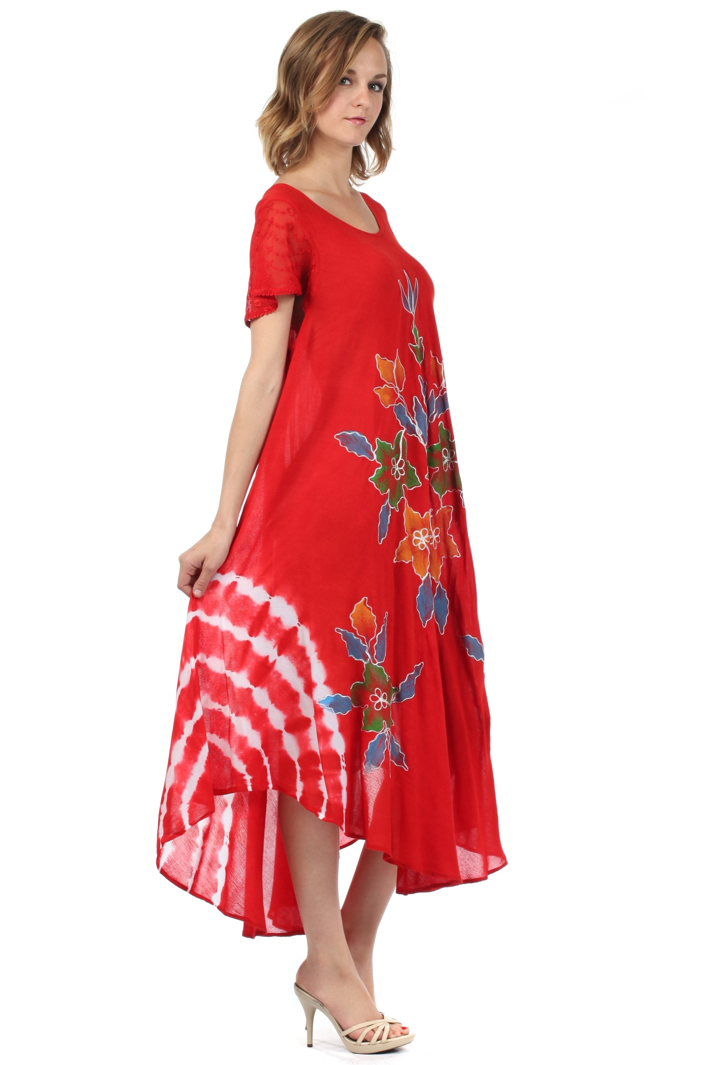 Woman wearing a red dress with floral patterns on a white background