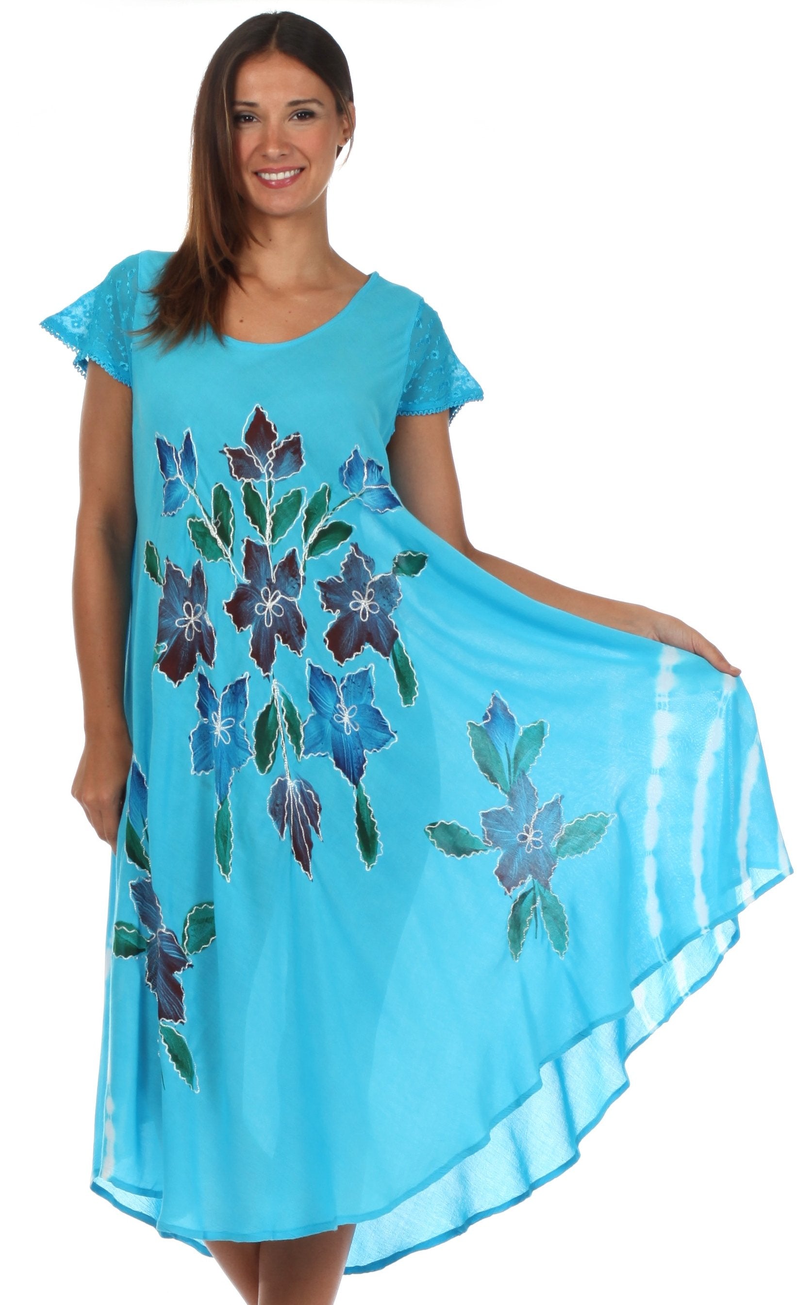 Woman wearing a blue dress with floral patterns on a white background